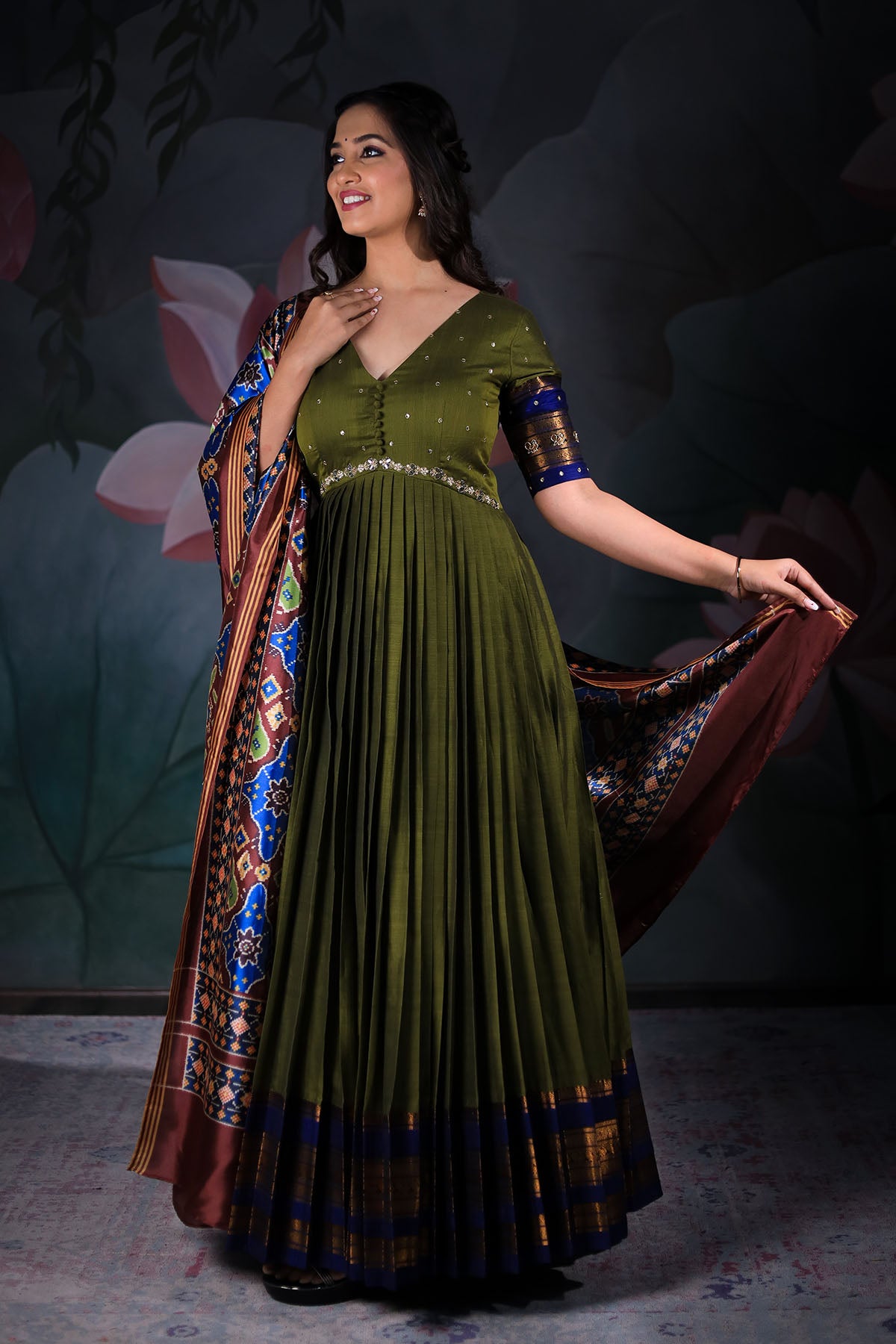 a woman in mehndi Green Anarkali Dress