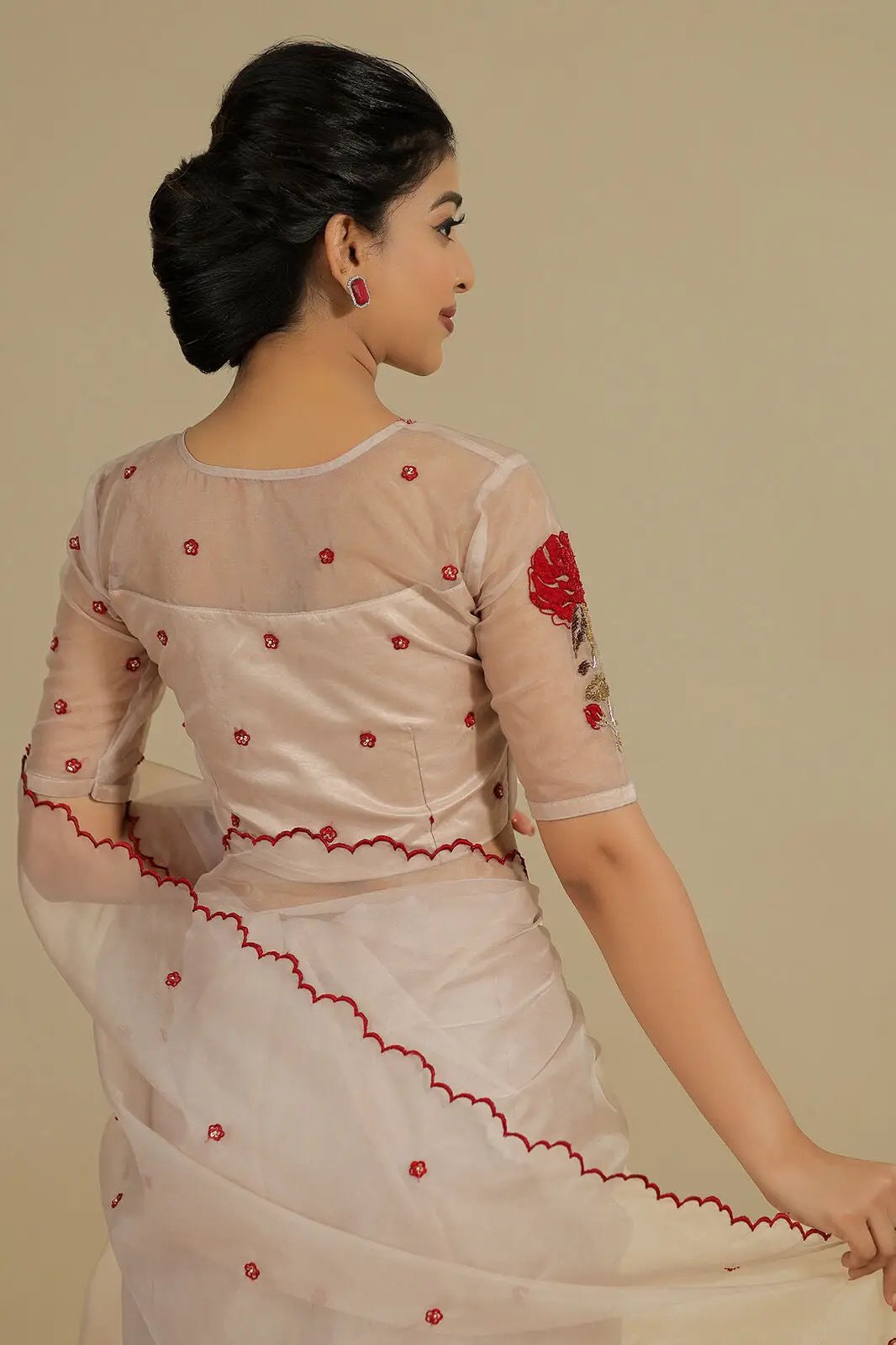 a woman in organza saree