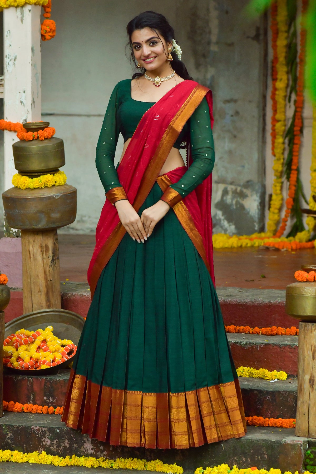 Dhruvika Halfsaree Lehenga Set in Green with red dupatta