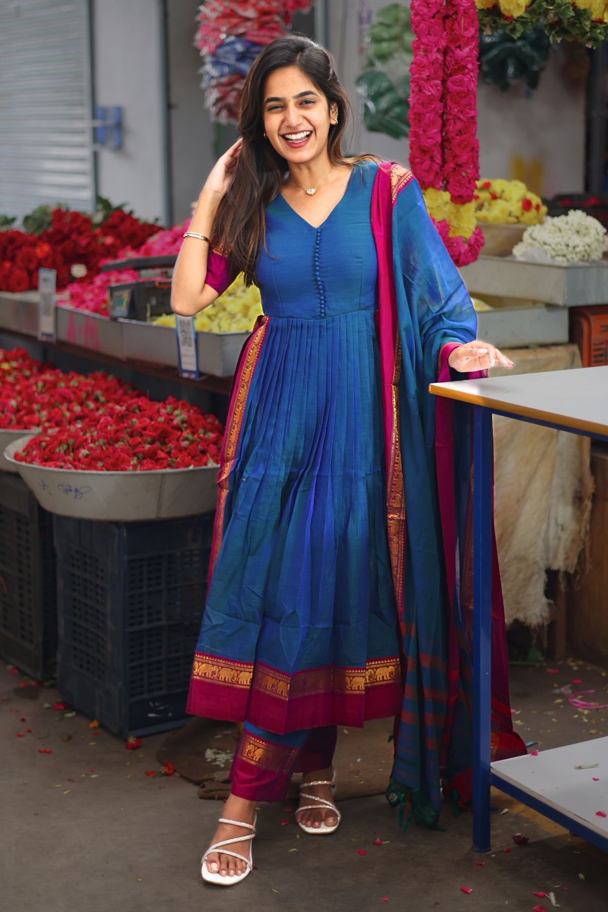 Exclusive Saanchi Kurta Set in Peacock Blue with intricate gold detailing, paired with a matching dupatta. Shop this elegant traditional outfit at bullionknot.