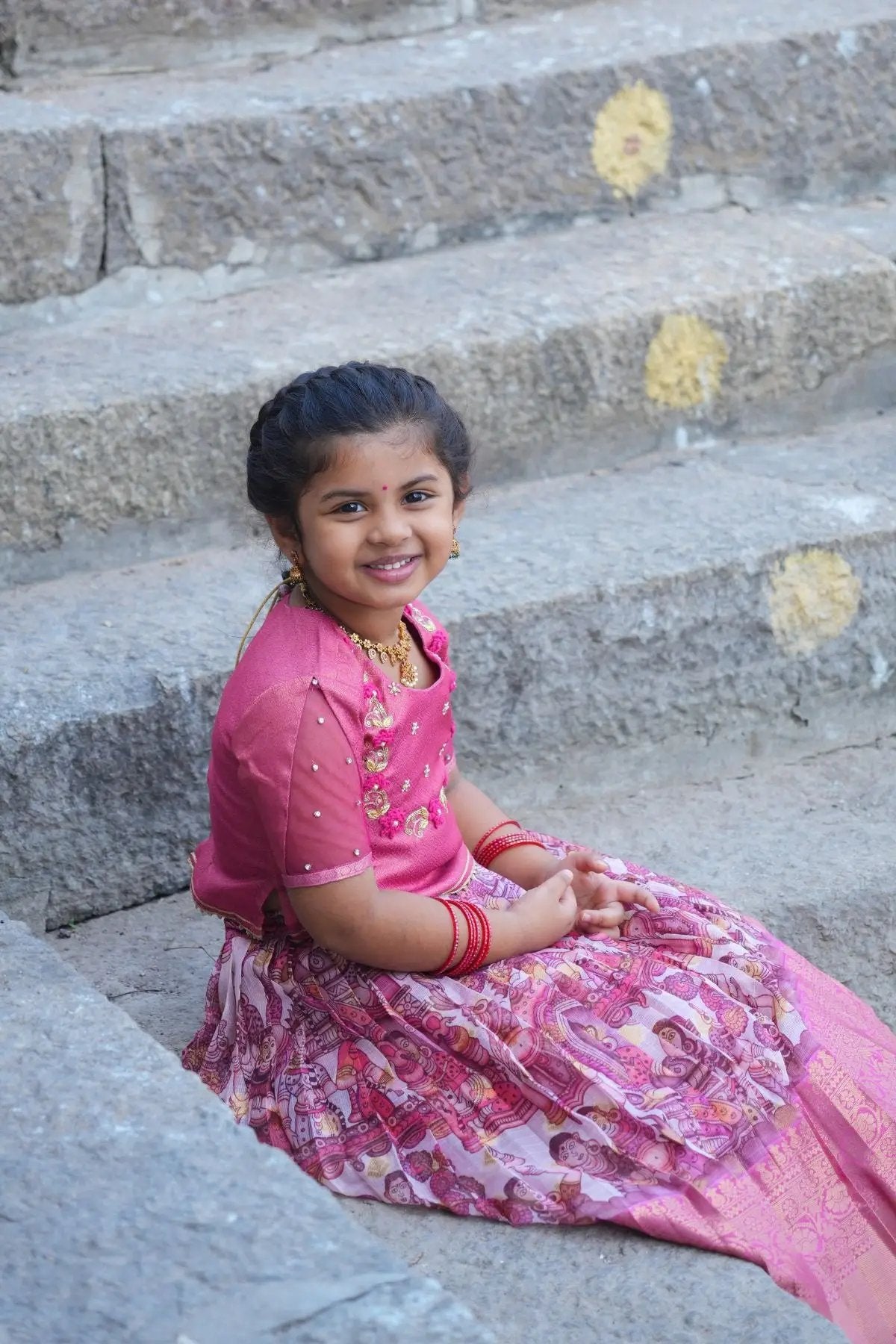 Stylish Baby Saanvi Lehenga Set in Pink, a kids' traditional outfit with a detailed embroidered blouse and a pleated lehenga, perfect for celebrations.