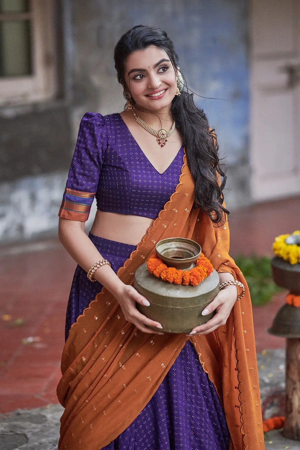 Traditional Akhila Naraynpet Lehenga in dark purple and orange