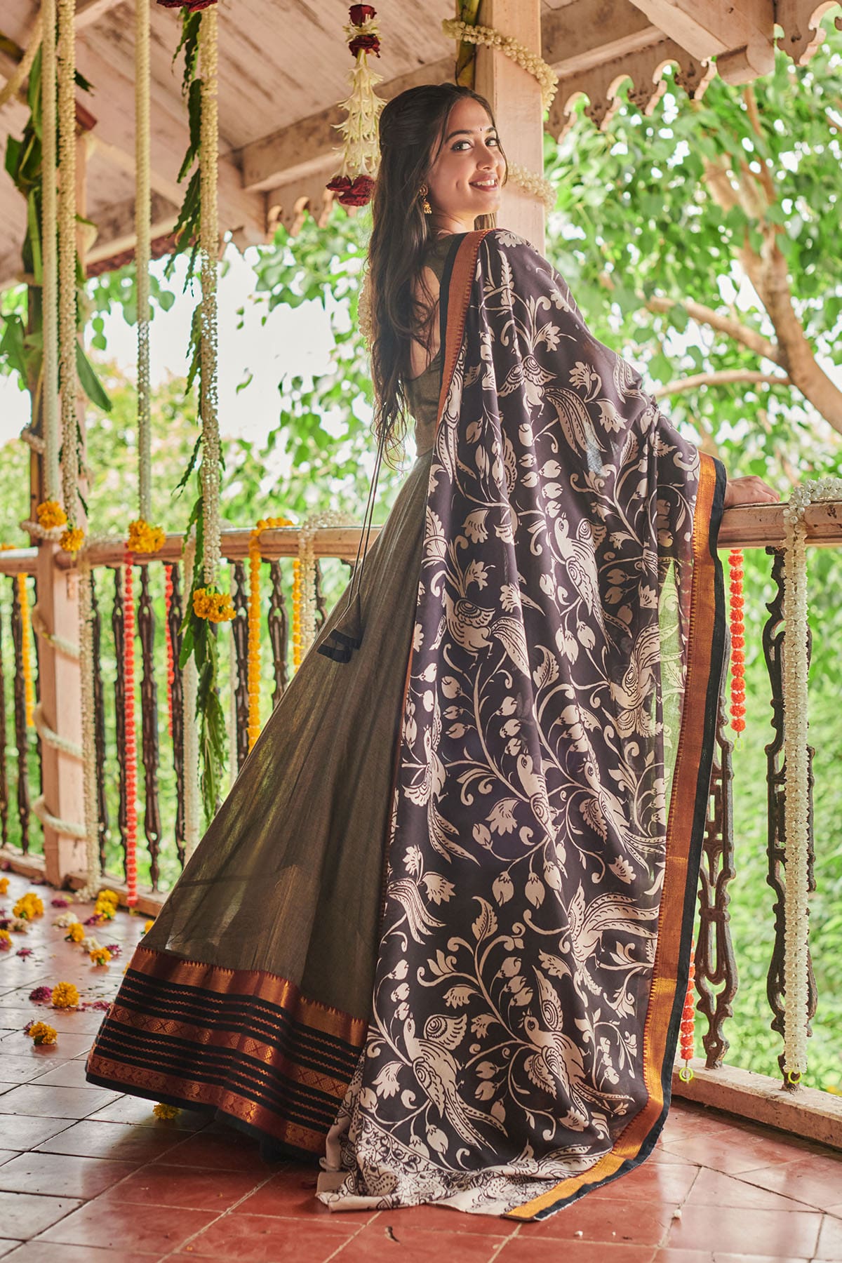 a woman in grey handloom dress