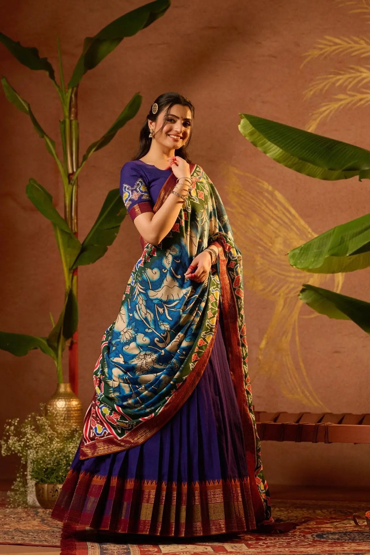 Traditional Shloka Kalamkari Lehenga Set in Blue with a pleated skirt and zari border, perfect for festive occasions.