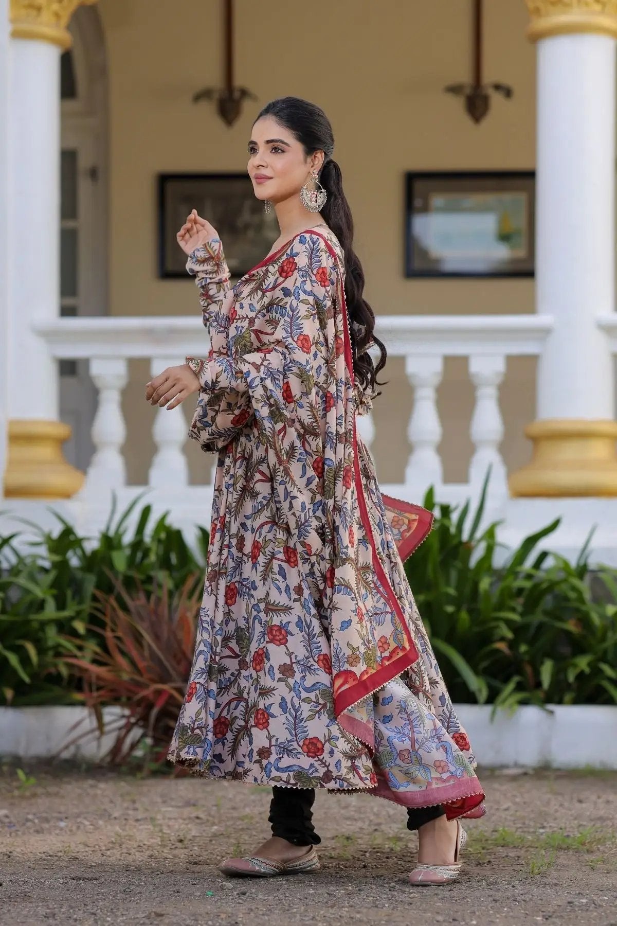 Side profile of Mihika Anarkali dress in beige with red border