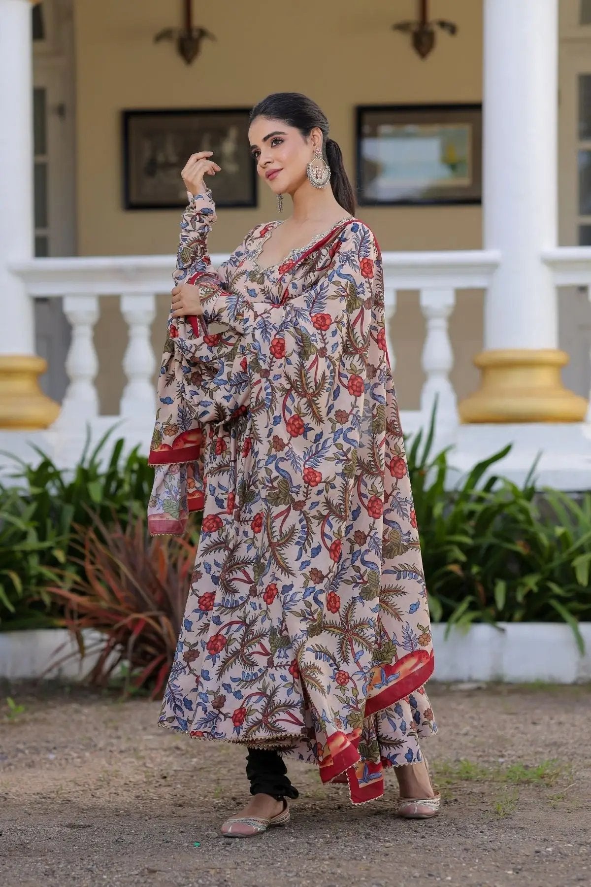 Side view of Mihika Anarkali dress in beige with floral motifs