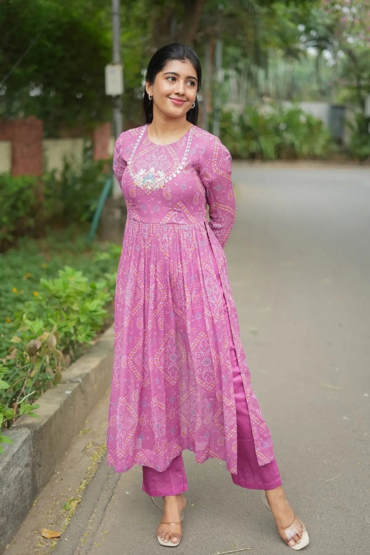 Pragati Kurta Set in Pink featuring intricate bandhej print and gota patti handwork. A stylish and comfortable traditional wear for any occasion.