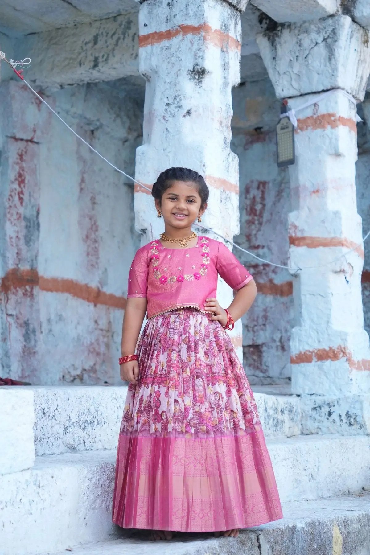 Charming Baby Saanvi Lehenga Set in Pink, a kids' ethnic outfit with delicate embroidery and a pleated skirt, perfect for weddings and celebrations.