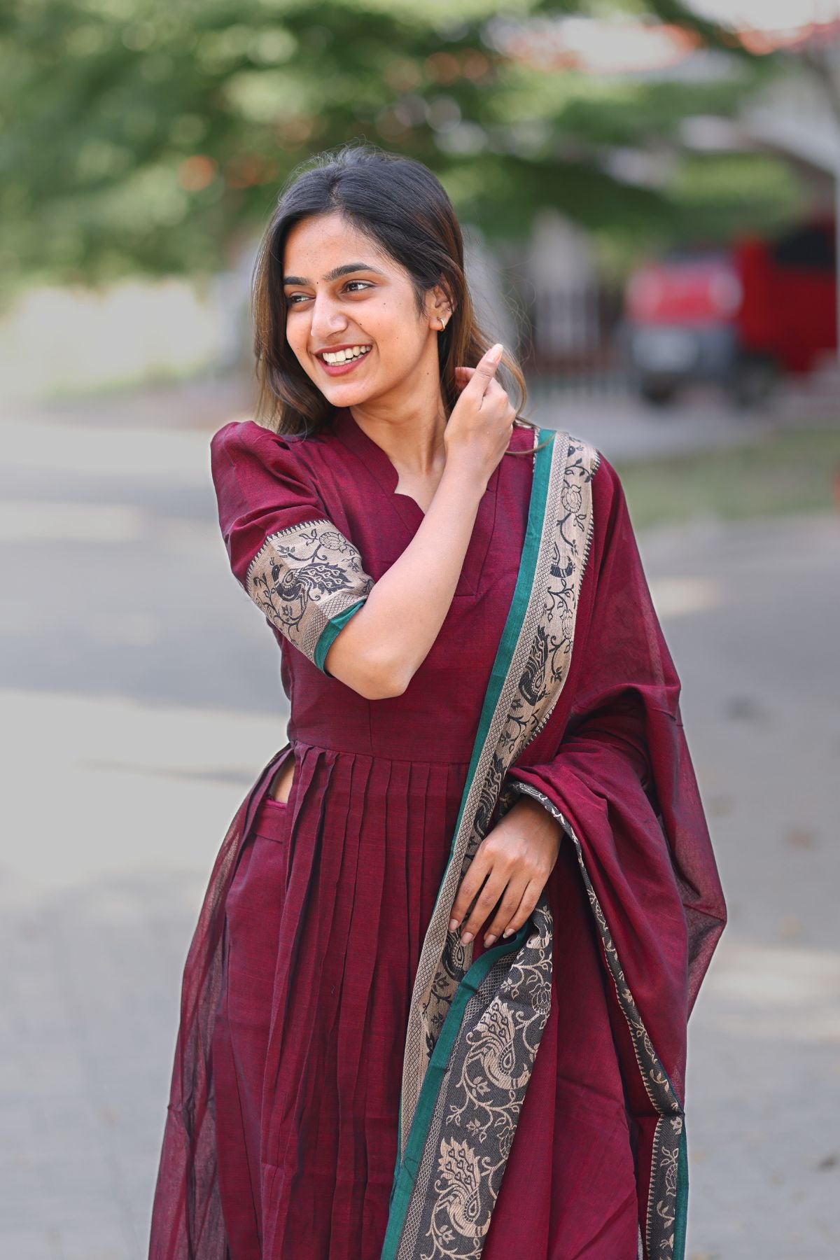 Stylish Ruhana Kurta Set in maroon with puffed sleeves and intricate gold embroidery, perfect for special occasions. Available at bullionknot.