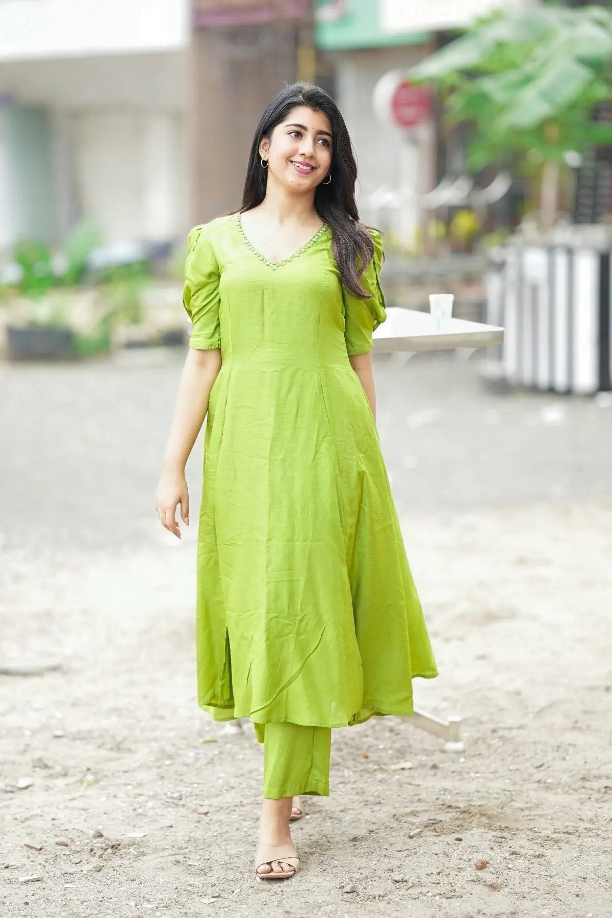 Graceful Sundar Kurta Set in Green with a flowy silhouette and comfortable fit. Ideal for ethnic and ceremonial wear.