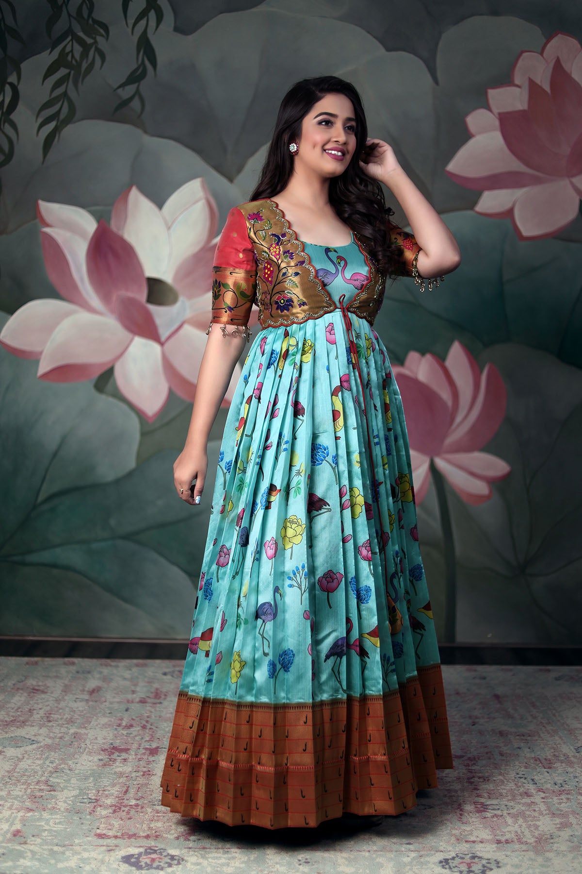 a woman in sky blue and pink Banarasi Dress
