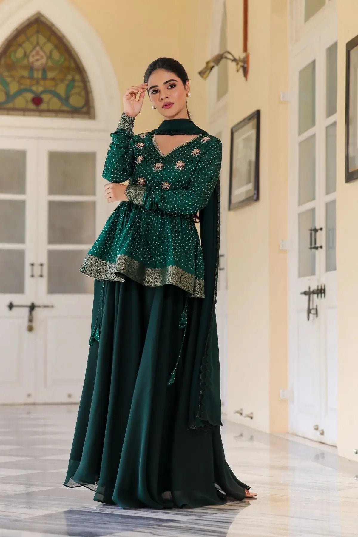 Full-length view of Sanika Indo-Western dress in deep green