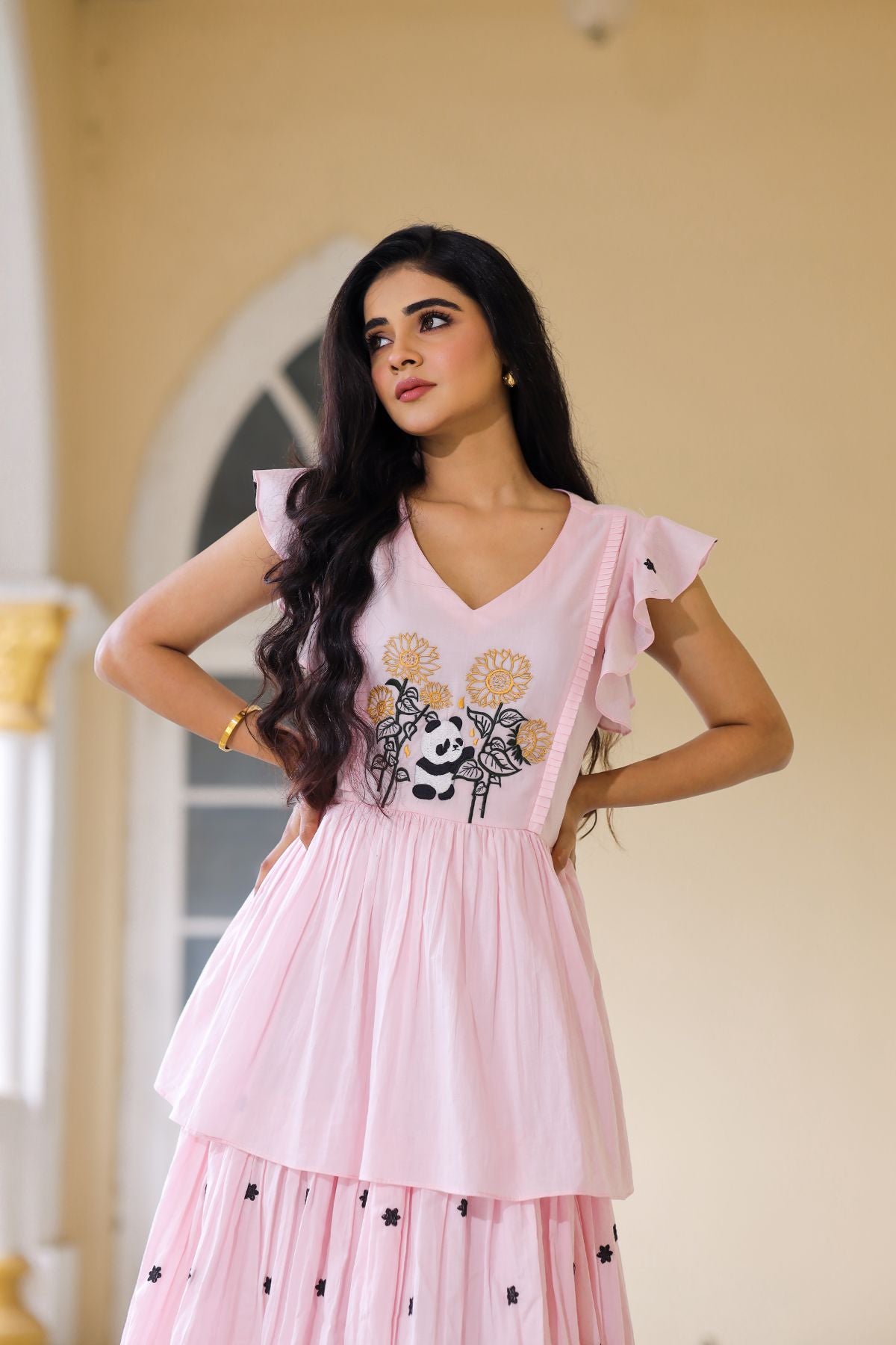 Stylish pink maxi dress with layered skirt and floral embroidery