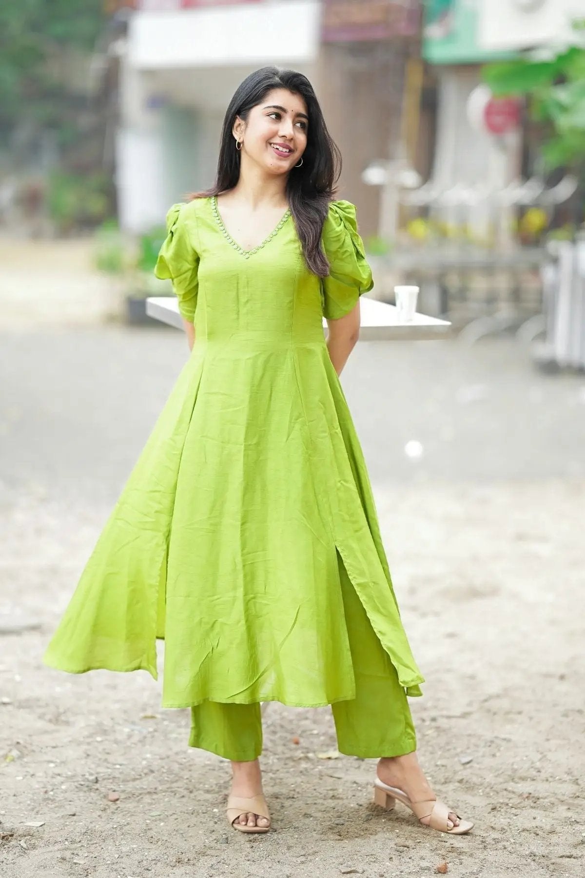 Exclusive Sundar Kurta Set in Green featuring a stylish flared kurta with puff sleeves and matching pants. Perfect for festive and formal occasions.