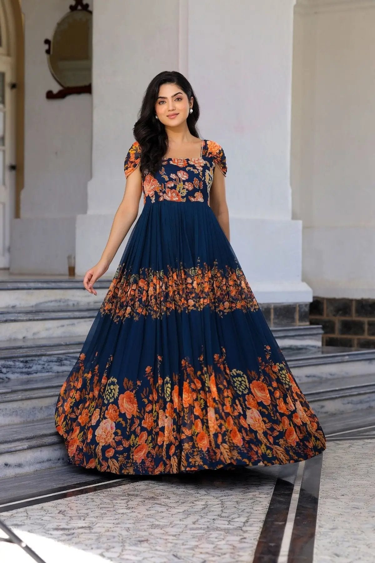 Flowing Zarna Maxi Dress in Navy Blue with vibrant floral print