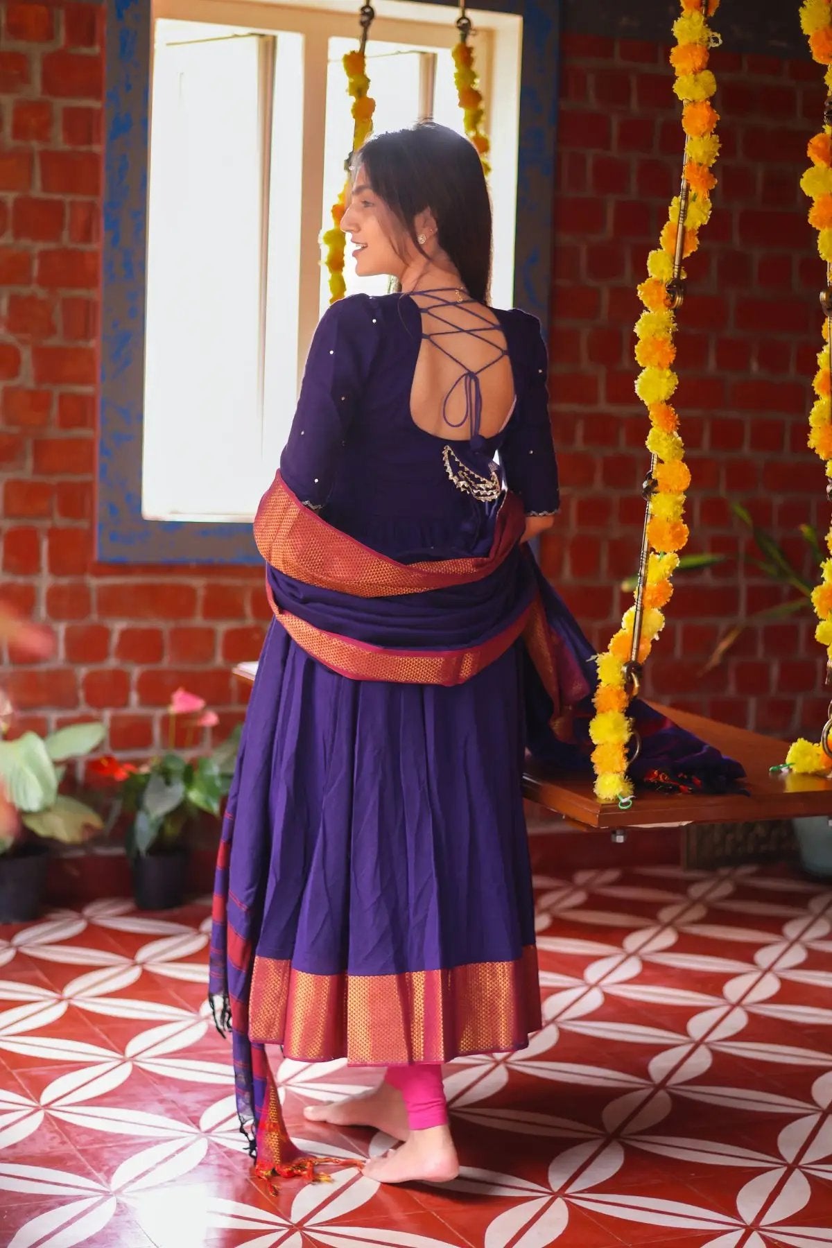 Back view of Meghna Anarkali dress with lace-up design