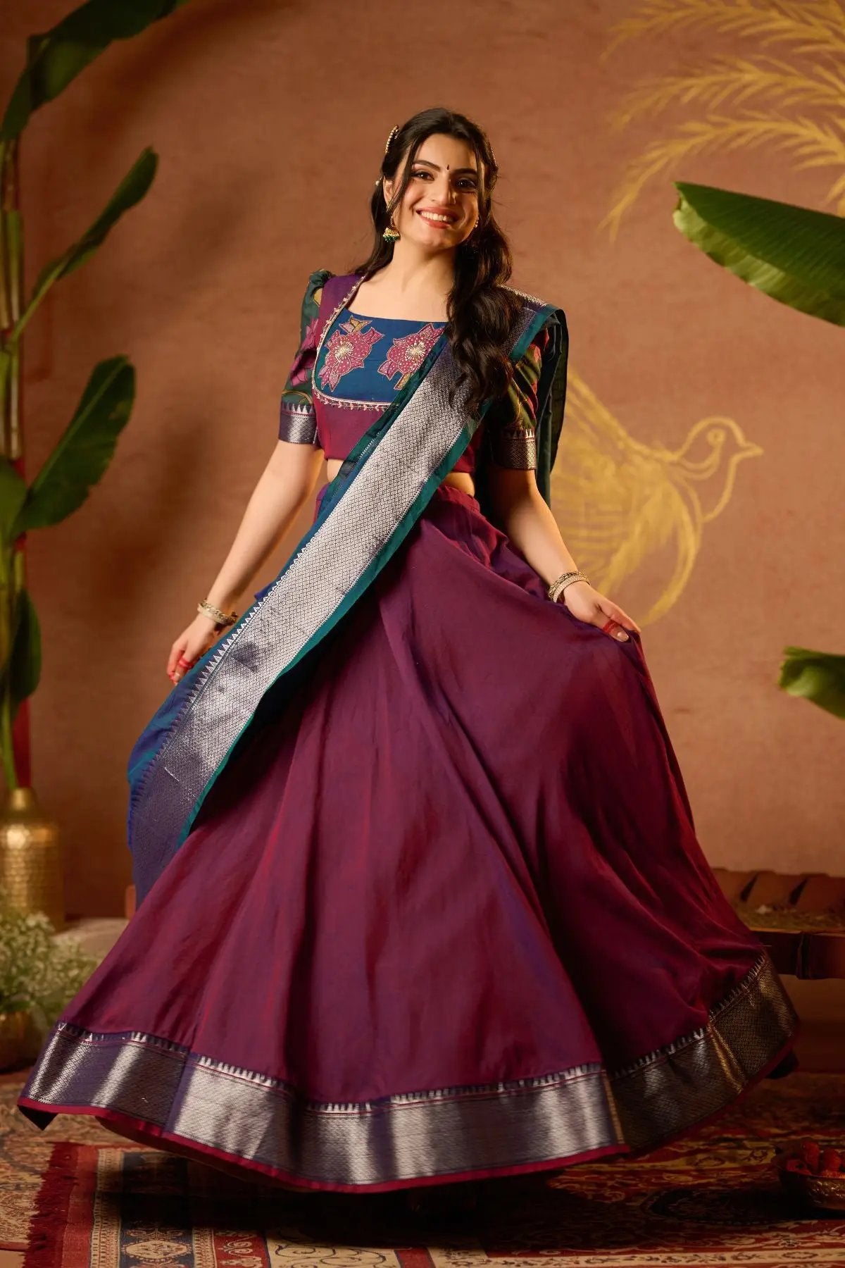 Exclusive Vamika Lehenga Set in Wine with intricate embroidery and a 5-meter skirt, perfect for weddings and ceremonies. Available at bullionknot.