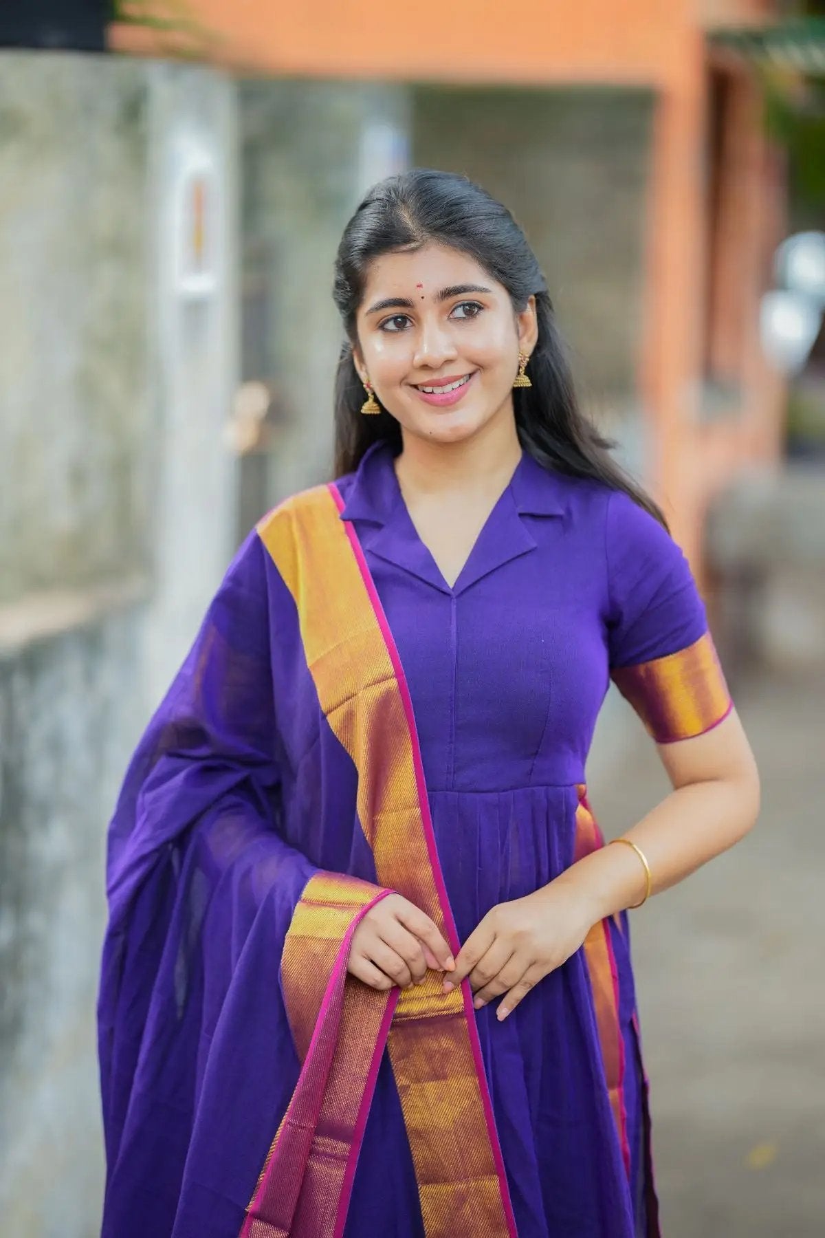 Close-up of Paridhi Handloom Suit Set in vibrant purple