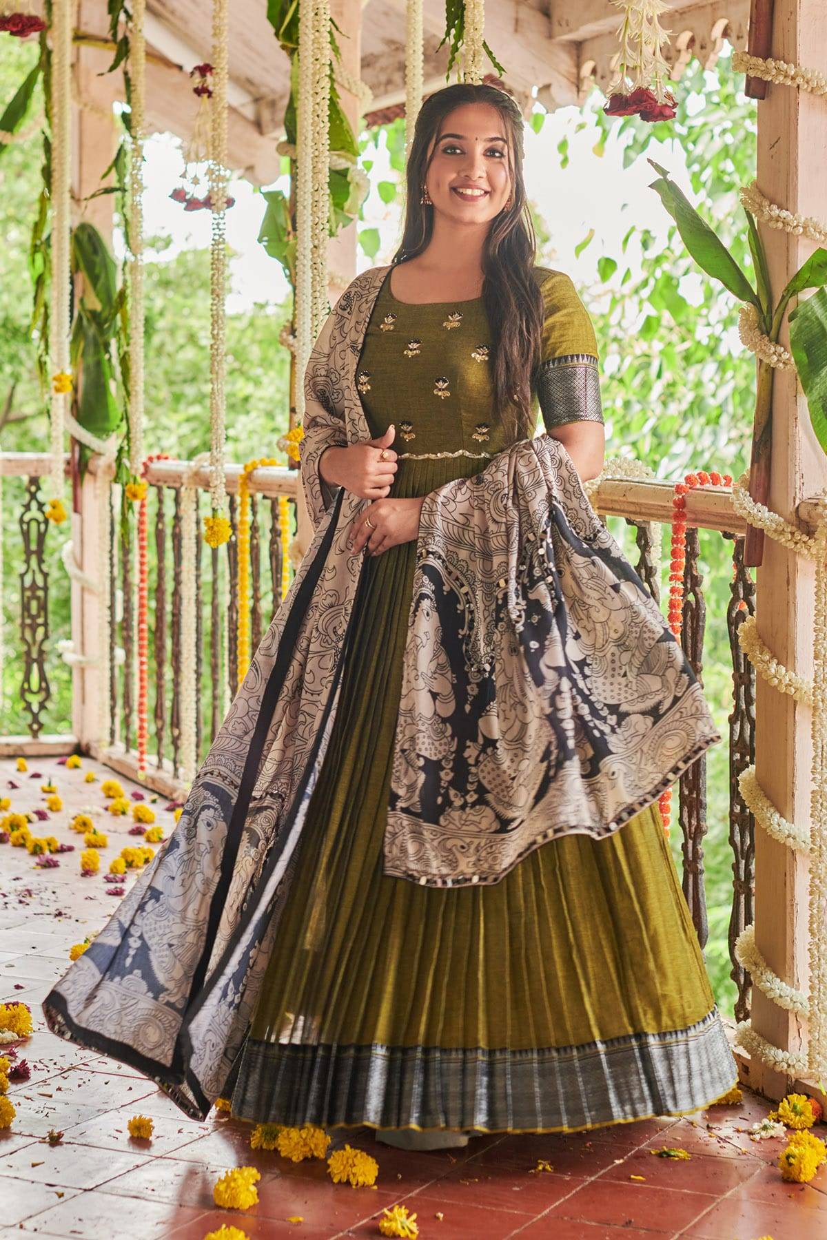 a woman in green cotton dress