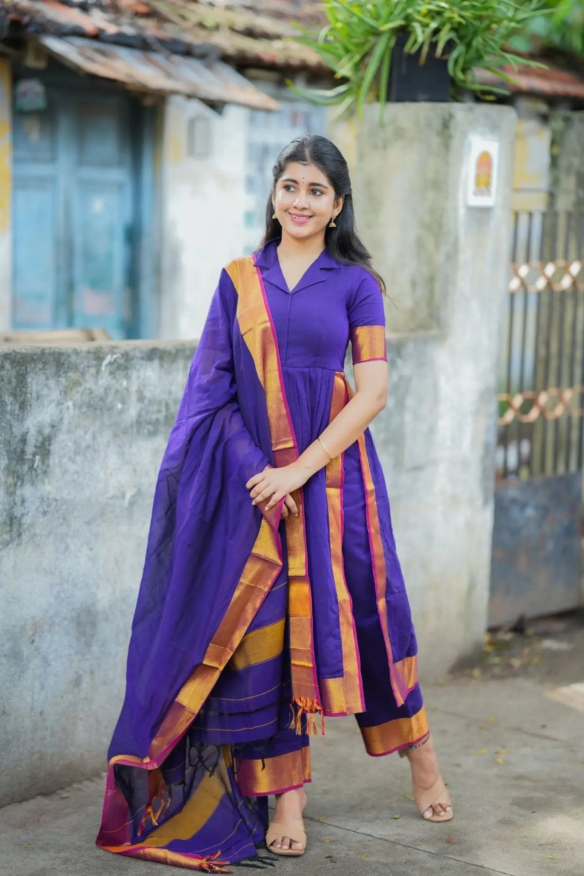 Traditional purple handloom suit set with gold details