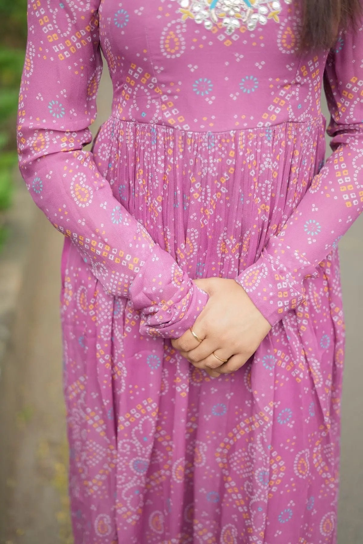 Detailed view of Pragati Kurta Set in Pink highlighting the pleated design and intricate bandhej print for a sophisticated ethnic look.