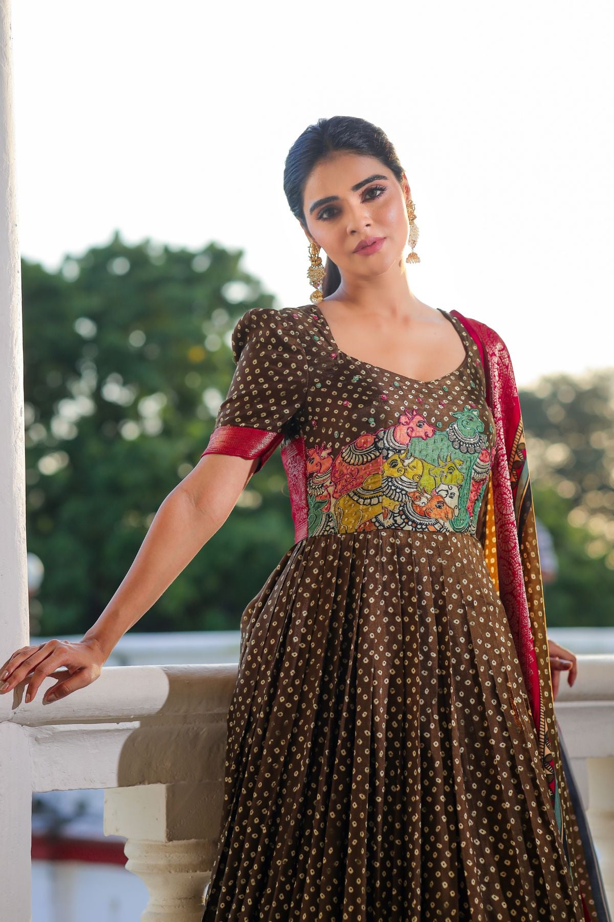 Elegant olive green Banarasi dress with colorful floral design