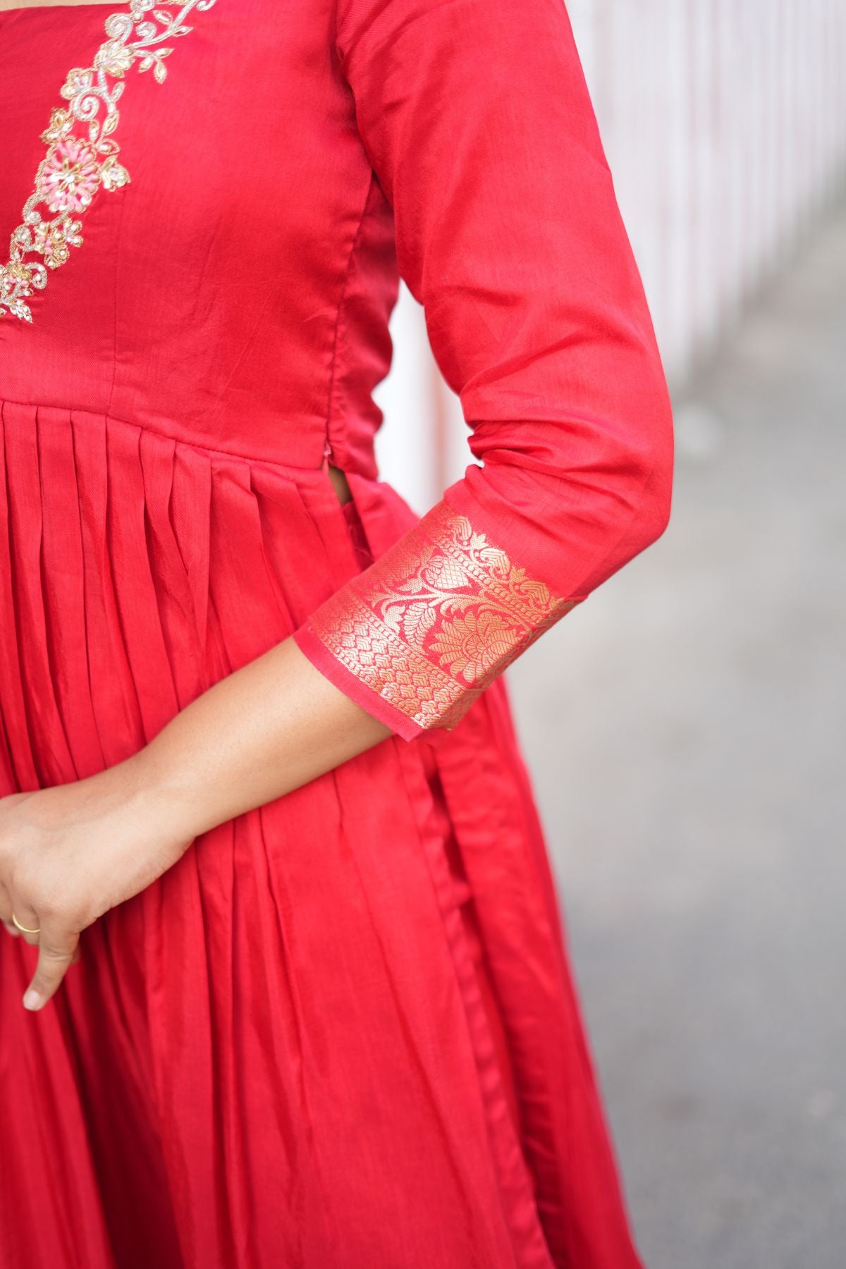 Detailed view of the sleeve design on Madhubala Silk Kurta Set in Red, featuring Banarasi border and rich silk fabric. A perfect blend of tradition and style.