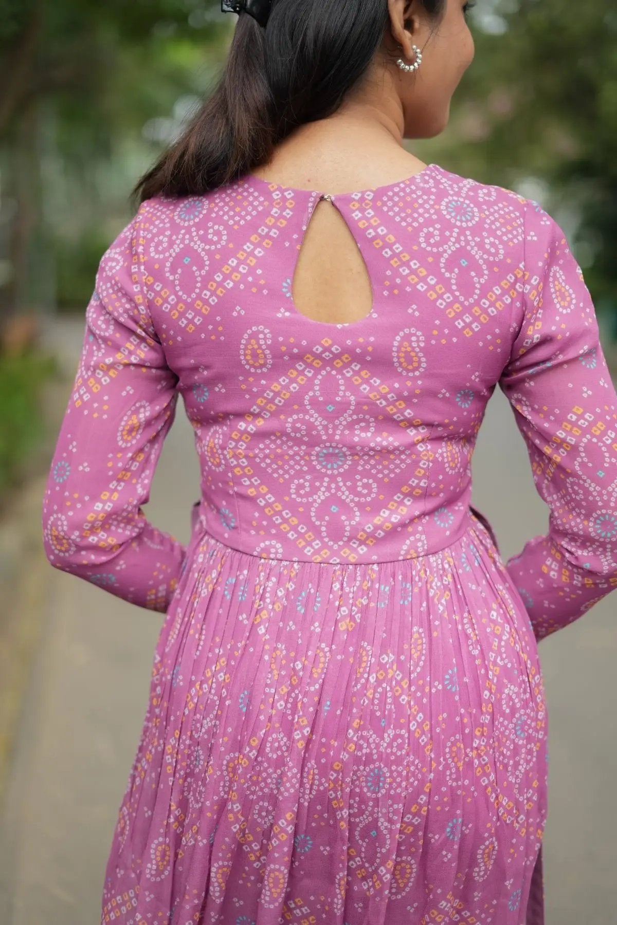 Back view of Pragati Kurta Set in Pink with a keyhole design and bandhej print, offering a graceful and traditional appeal.