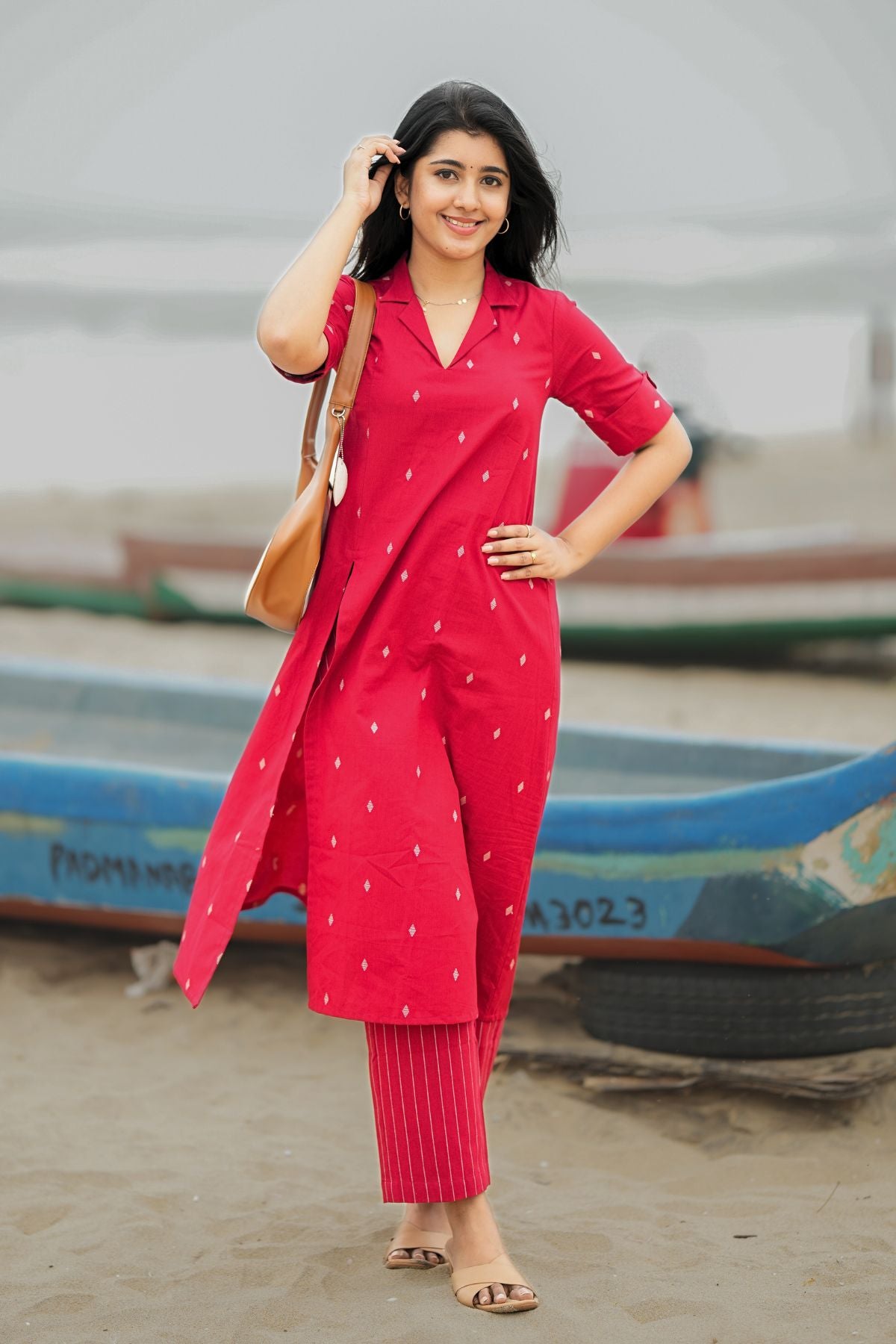 Exclusive Syahi Co-ord Set in Red featuring a stylish kurta with subtle embroidery and matching pants. Perfect traditional wear from bullionknot.