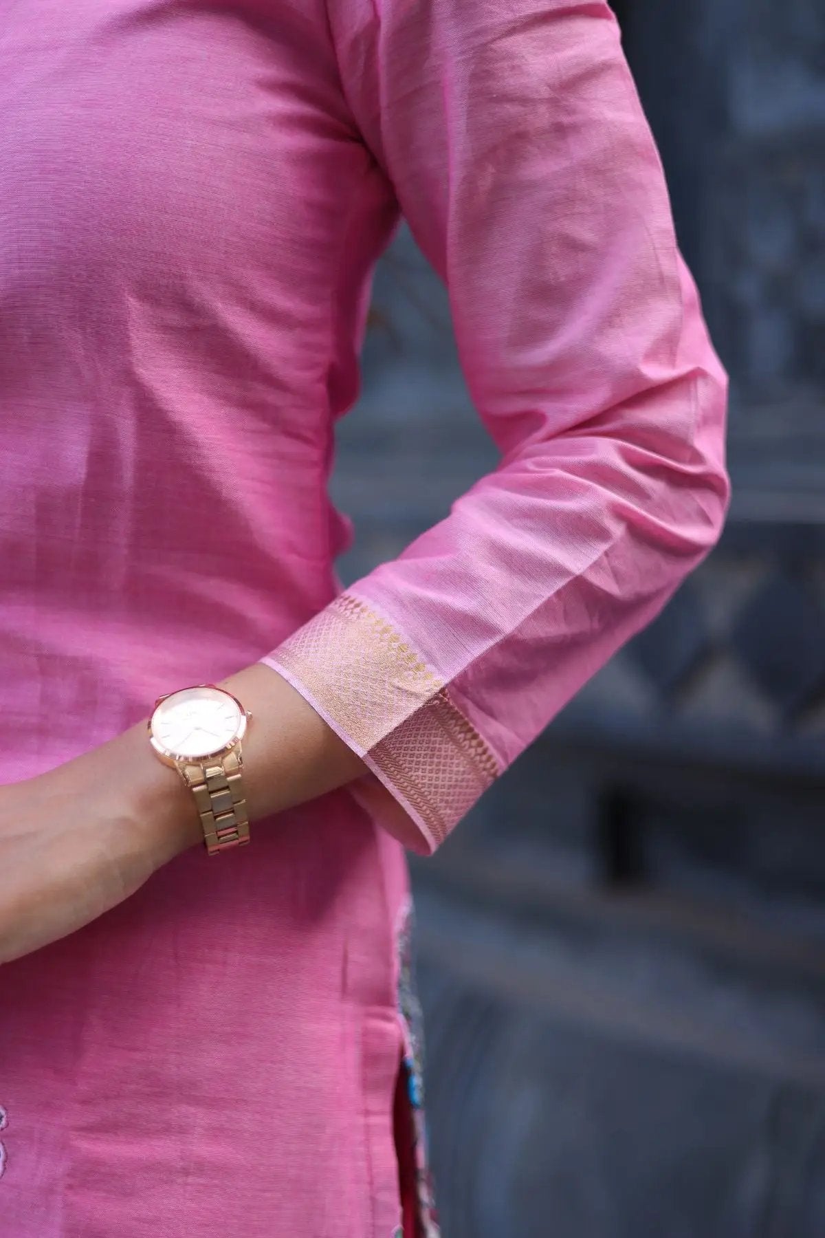 Close-up of the sleeve detailing on the Chhaavi Kurta Set in Pink, featuring delicate golden accents for a refined traditional appeal.