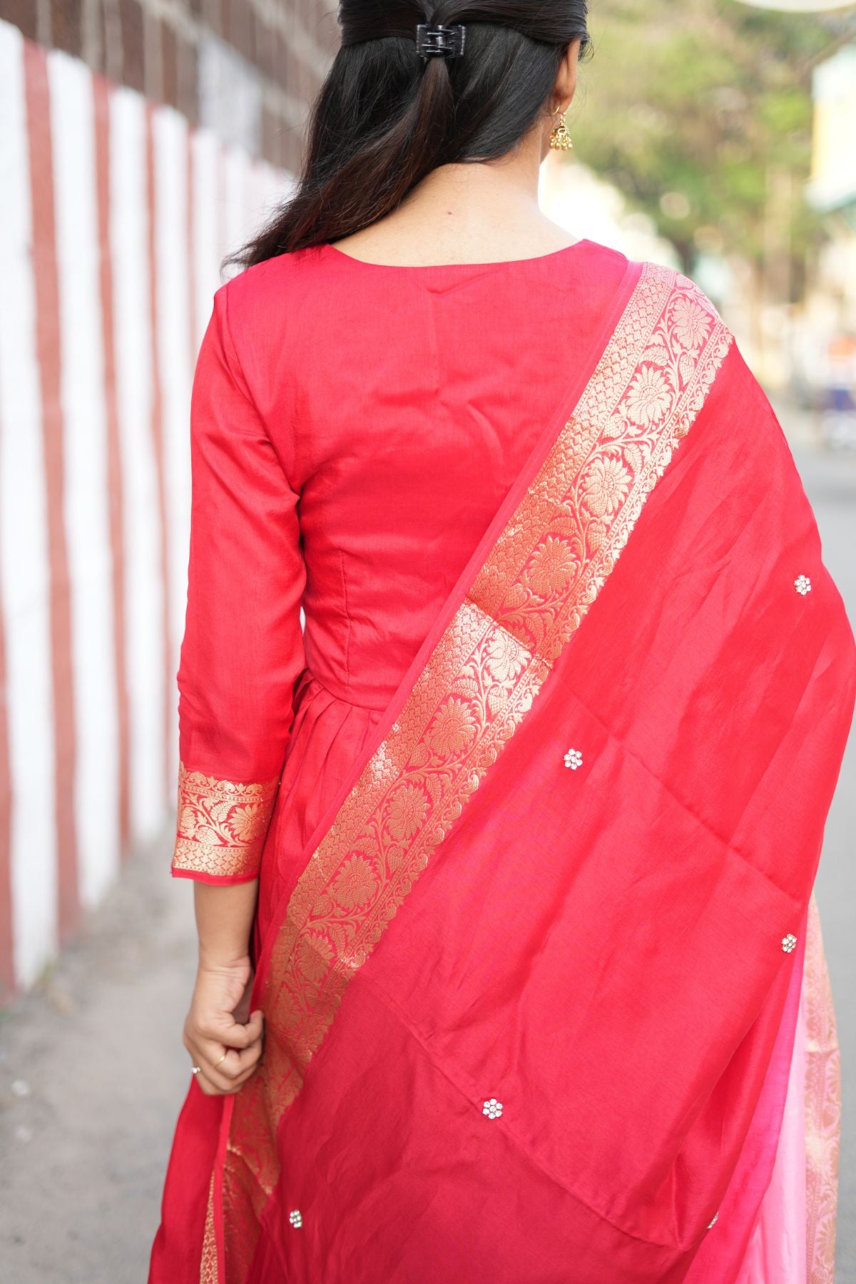 Back view of Madhubala Silk Kurta Set in Red, showcasing the rich silk fabric and Banarasi dupatta. A classic ethnic dress for elegant occasions.