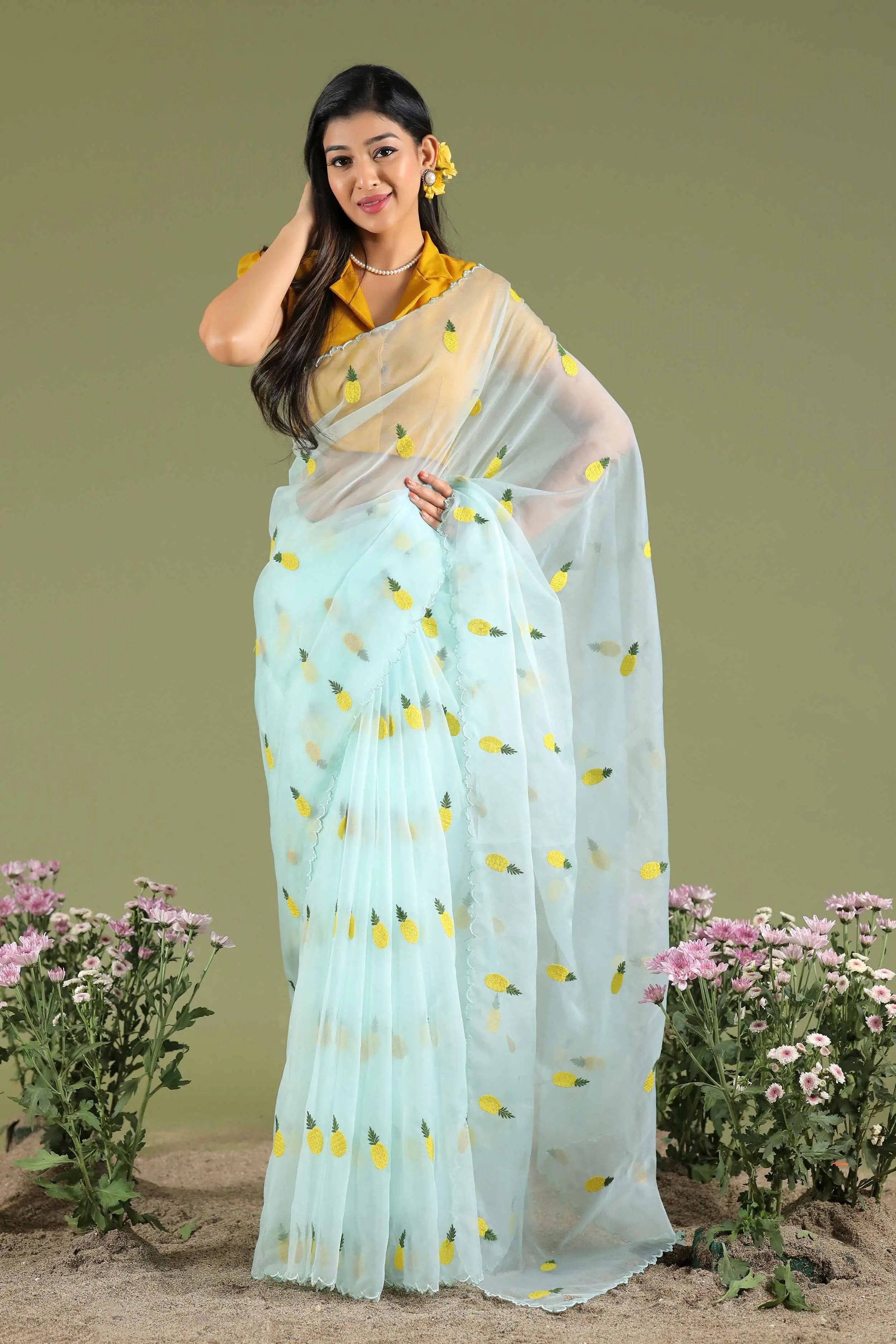 a woman in Yellow & Iceland Blue Ananas Organza Saree - Bullionknot