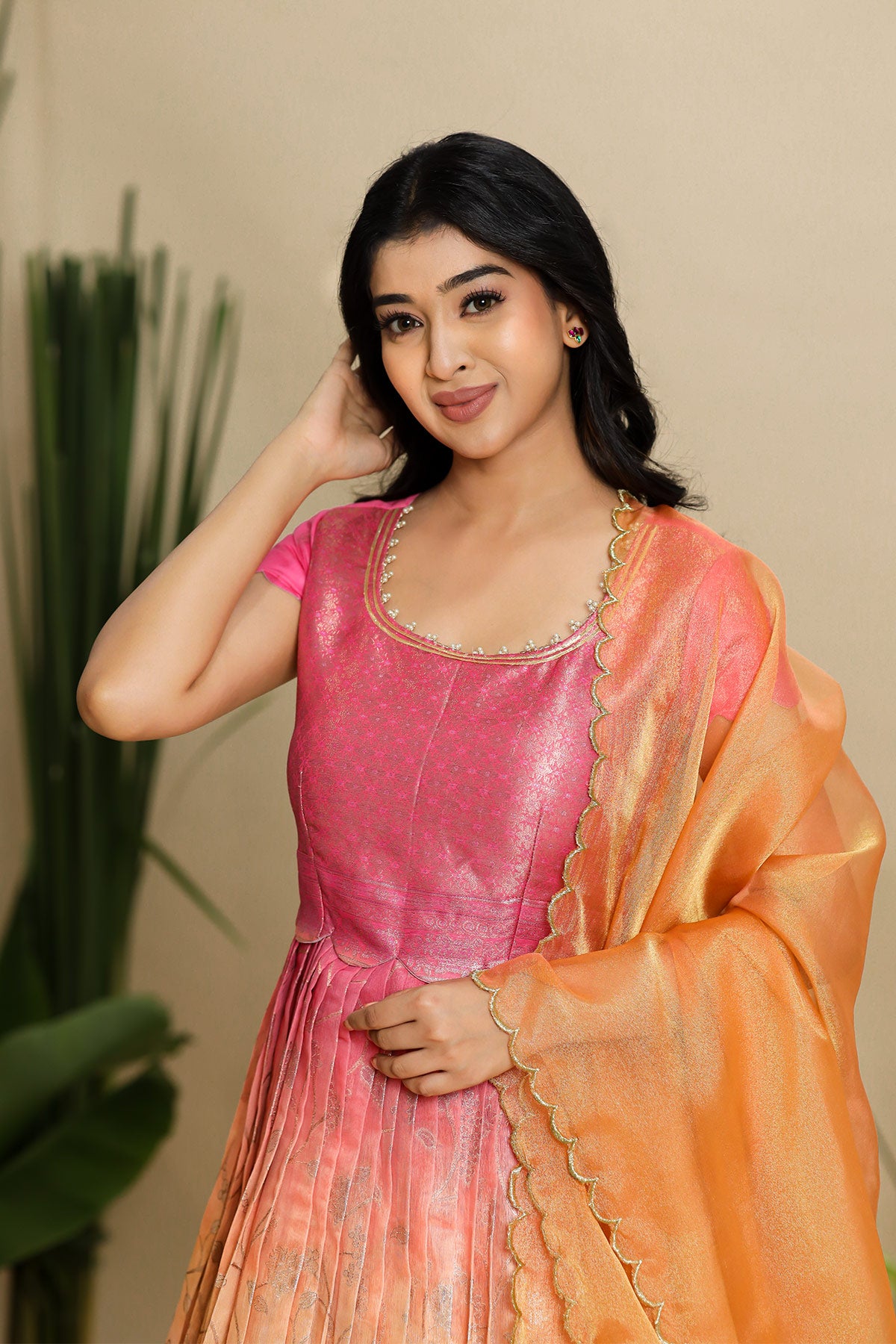 a woman in pink banarasi dress