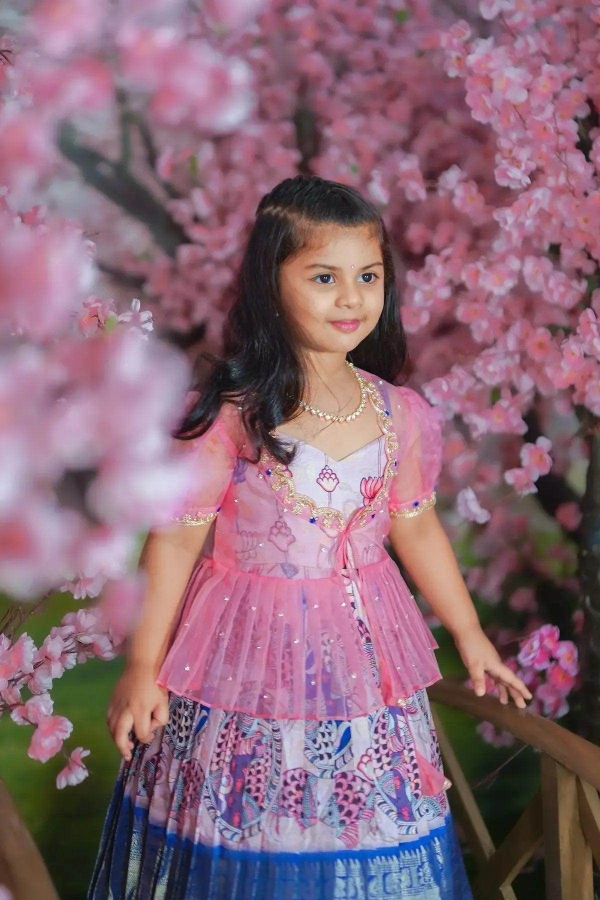 baby girl in pink pattu dress