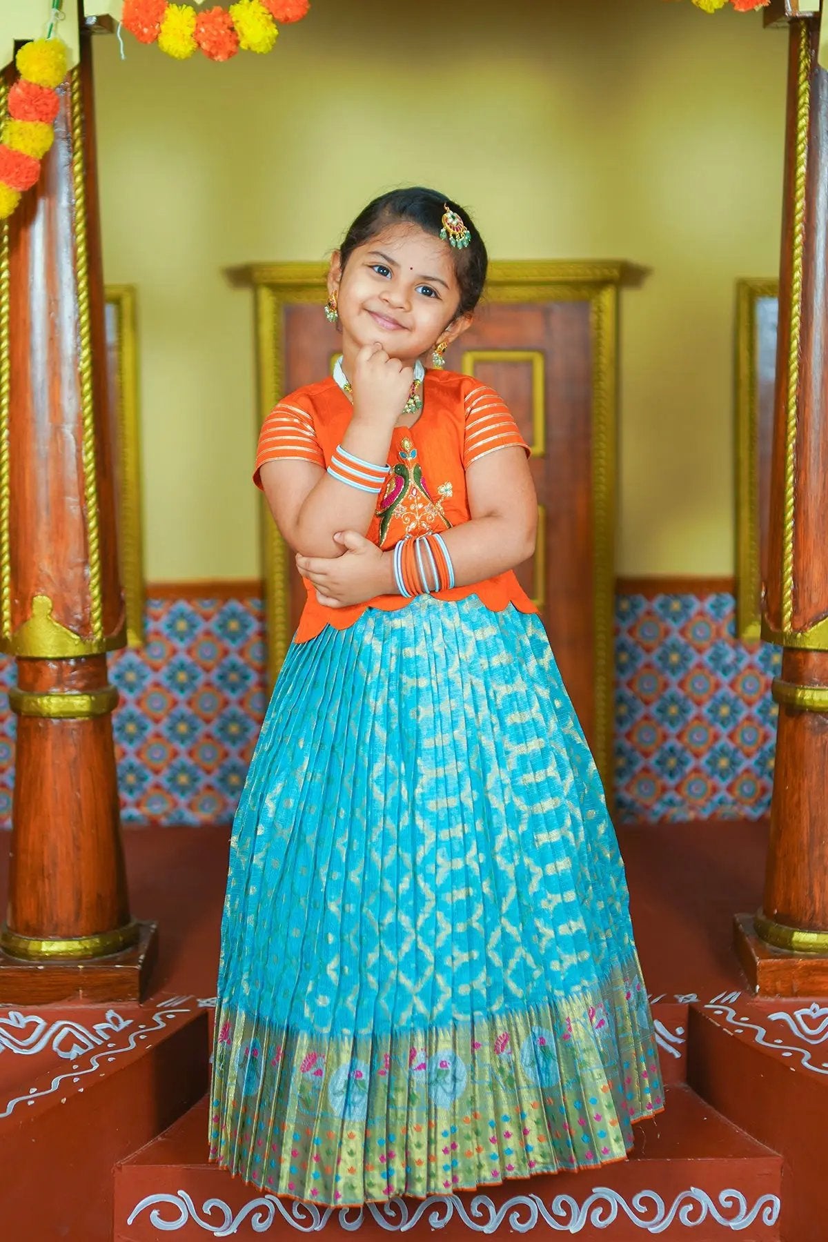 girl in orange and blue Baby Padmaja Lehenga Set - Bullionknot