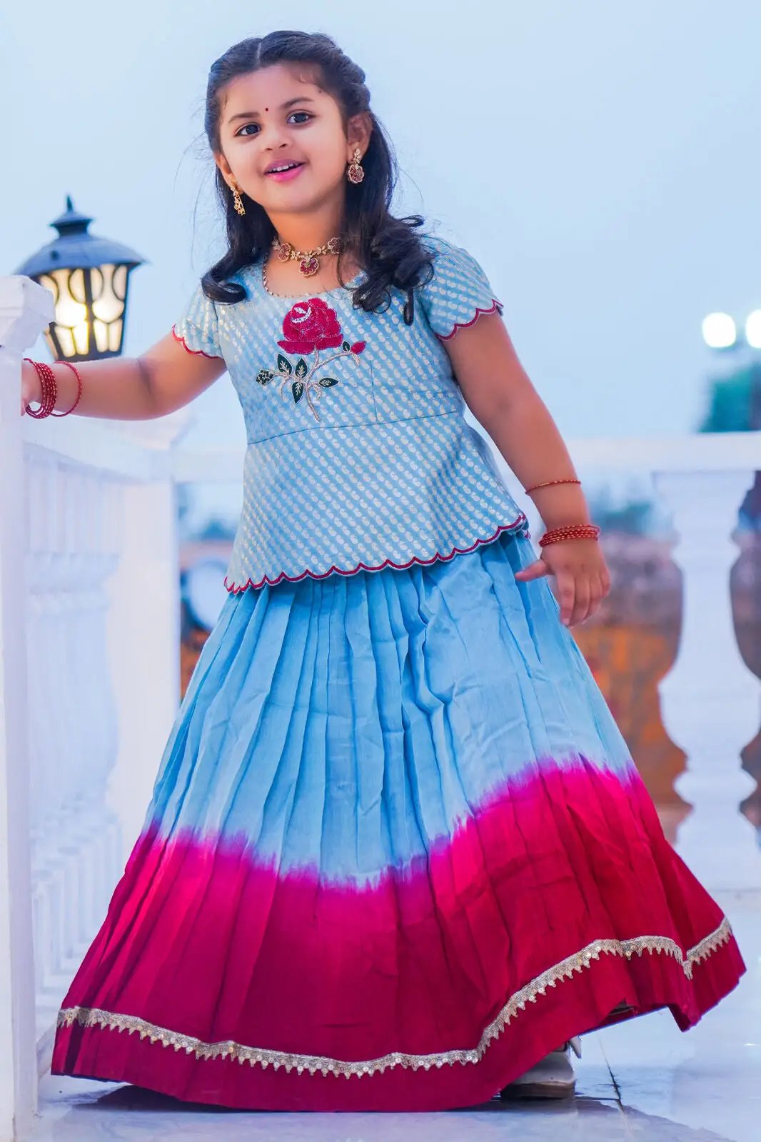 Baby in Moonstone Blue Lehenga Set with red accents