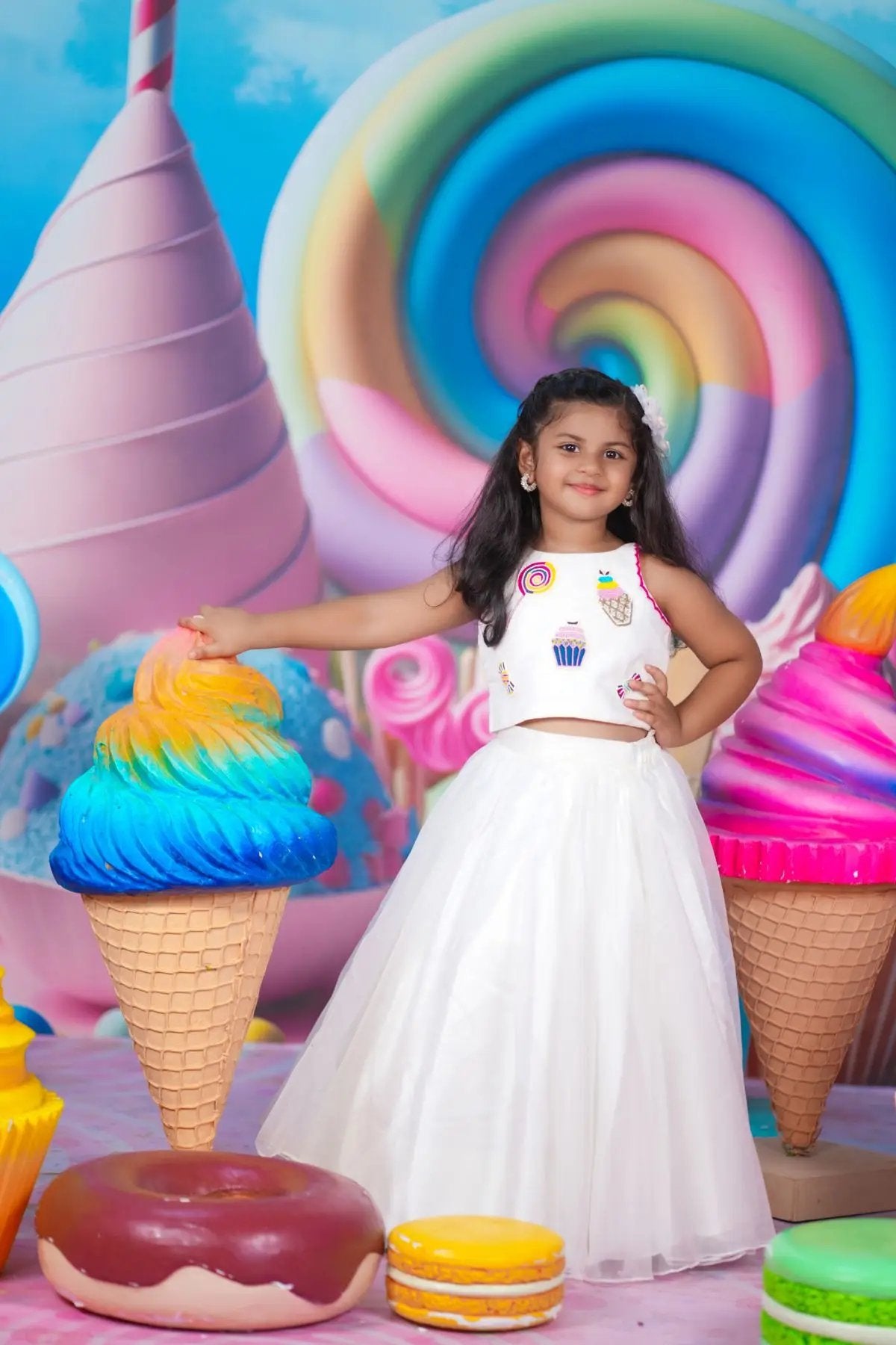 Exclusive Kids Wear - Baby Sophy Crop Top in White at bullionknot. Adorable white crop top with colorful candy-themed embroidery, perfect for 5-6 years.