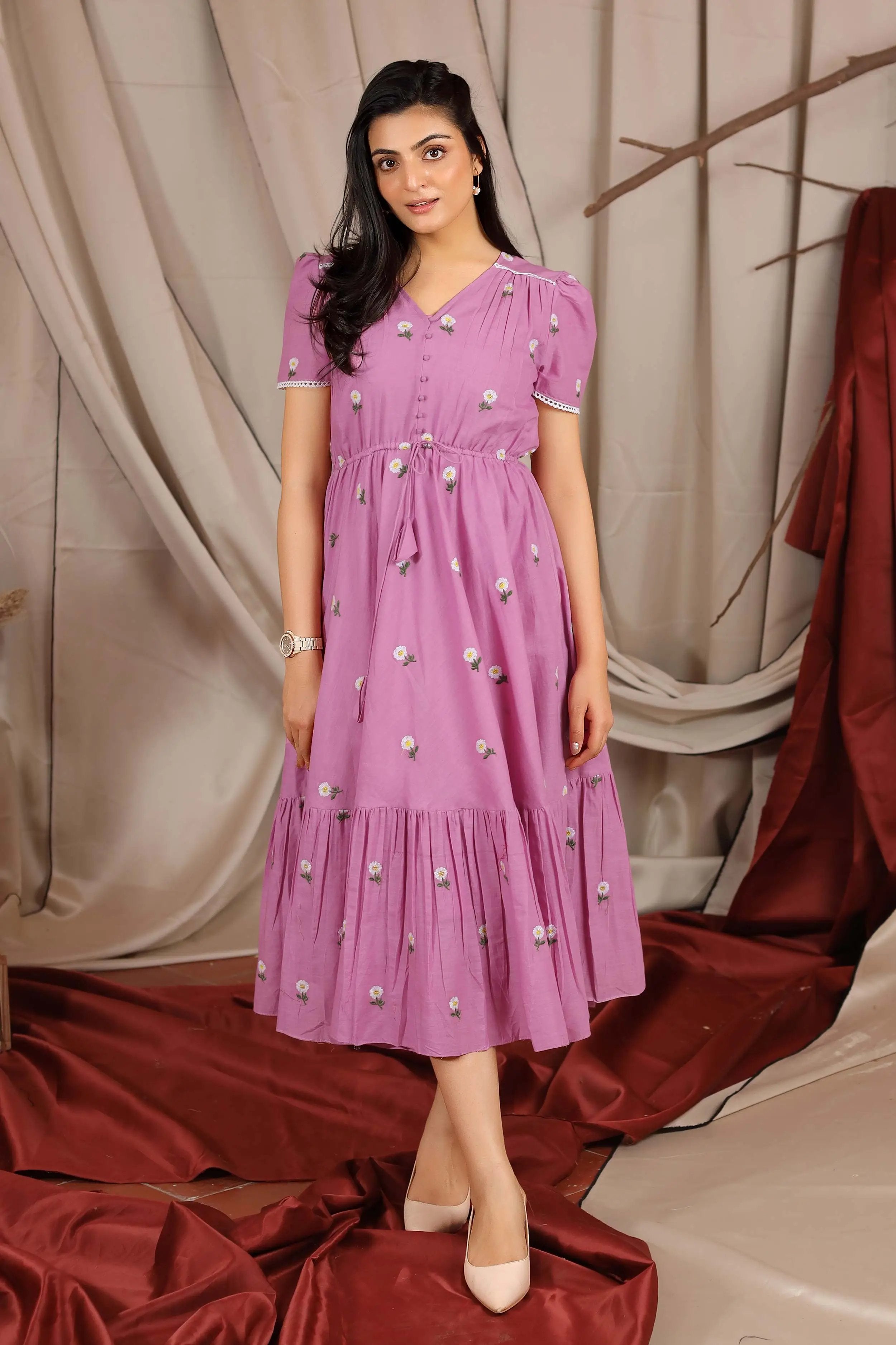 a woman in orchid cotton dress