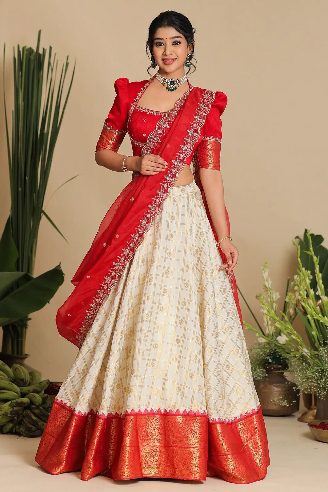 Brindadevi red half saree lehenga set with intricate embroidery