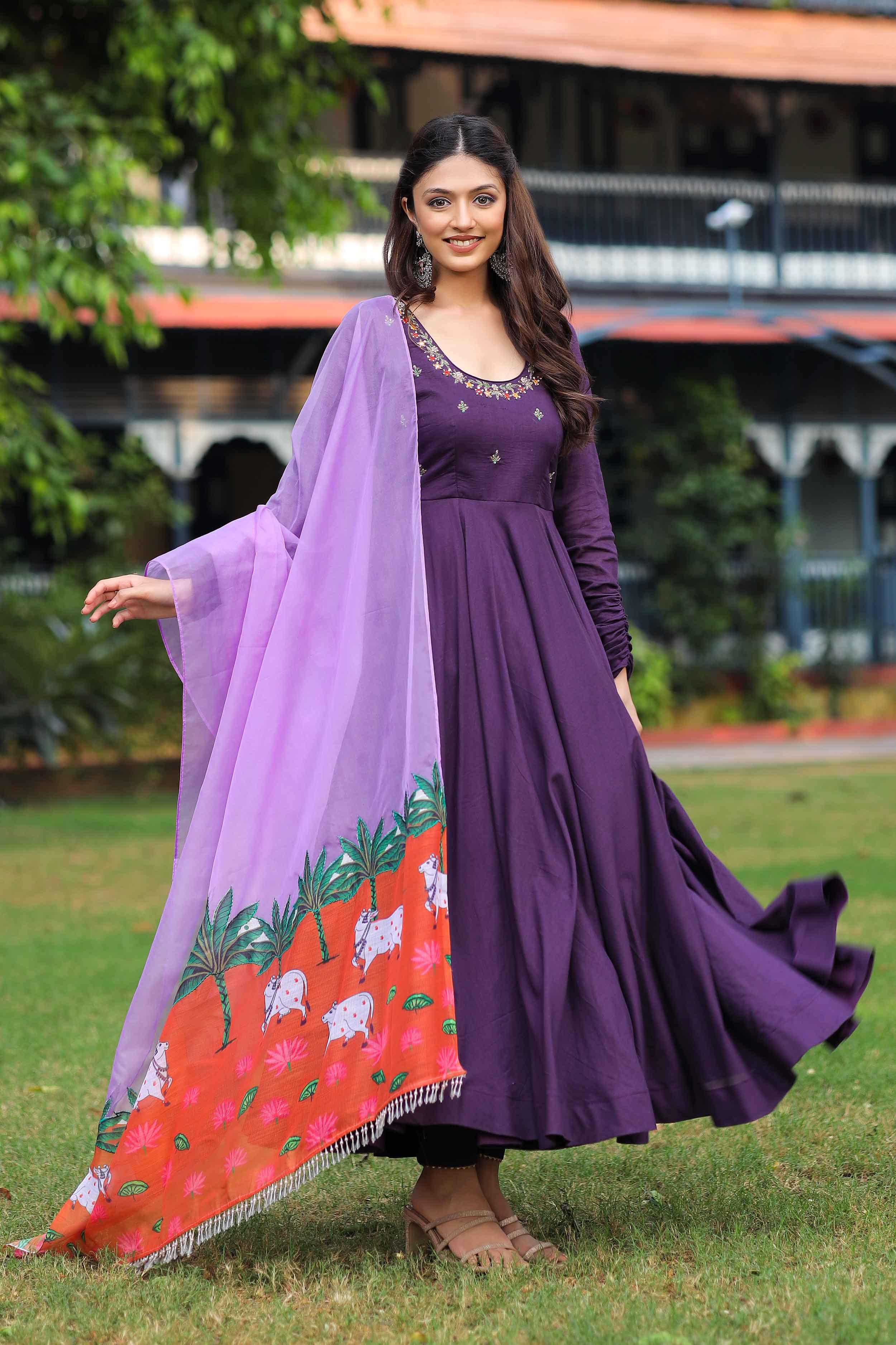 a woman in burgundy cotton dress