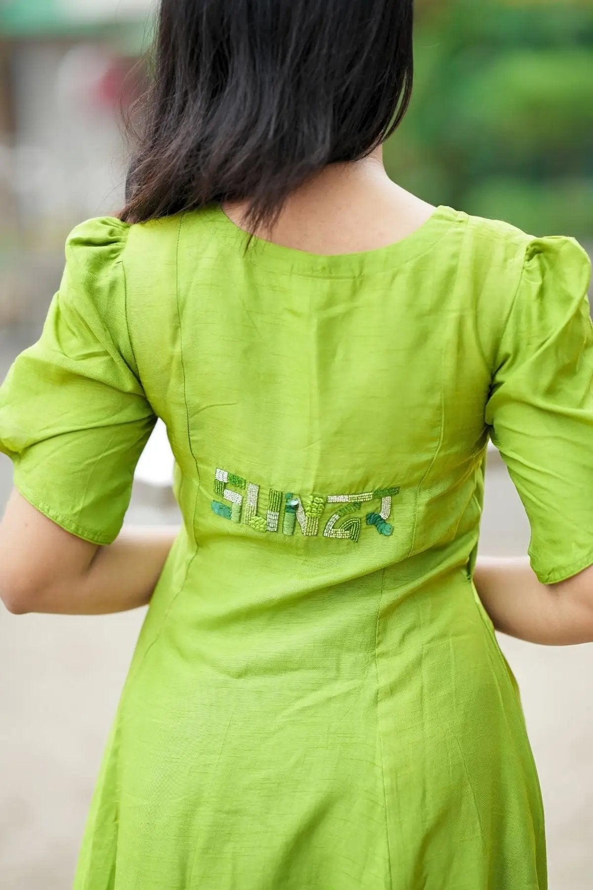 Back view of the Sundar Kurta Set in Green showcasing intricate embroidered detailing. A must-have traditional outfit for elegant styling.