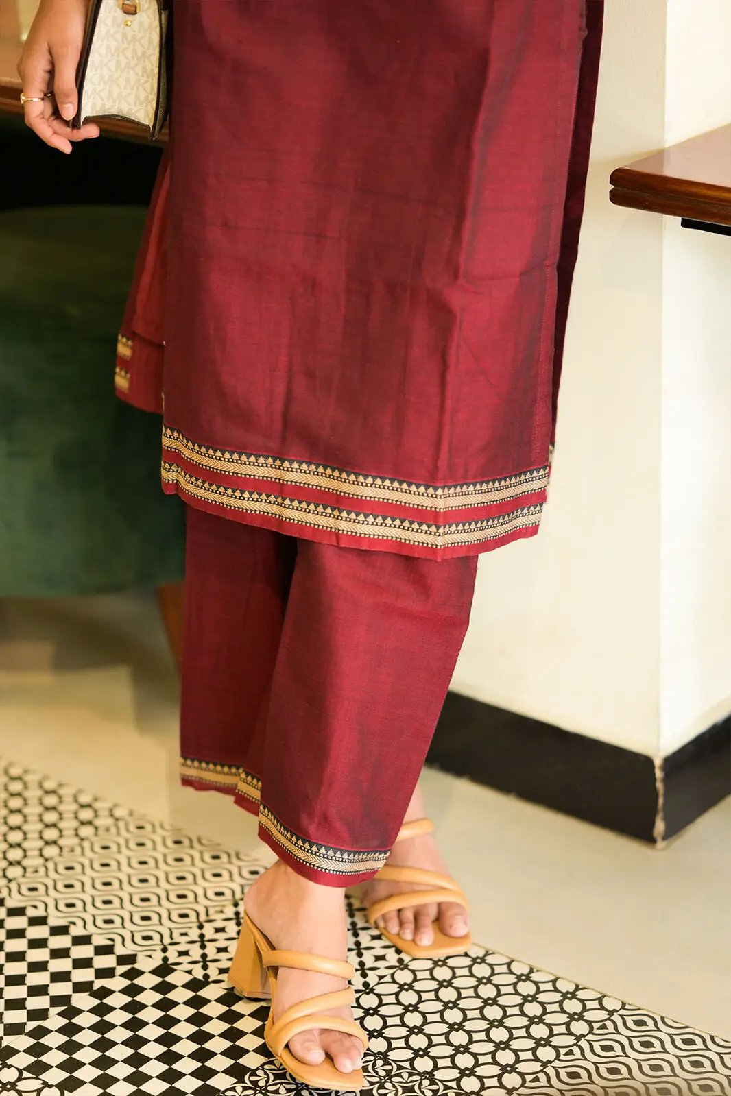 Maroon kurta set with detailed hem design