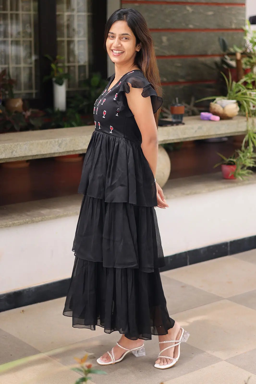 Back view of Gothic Black Midi Dress with tiered design