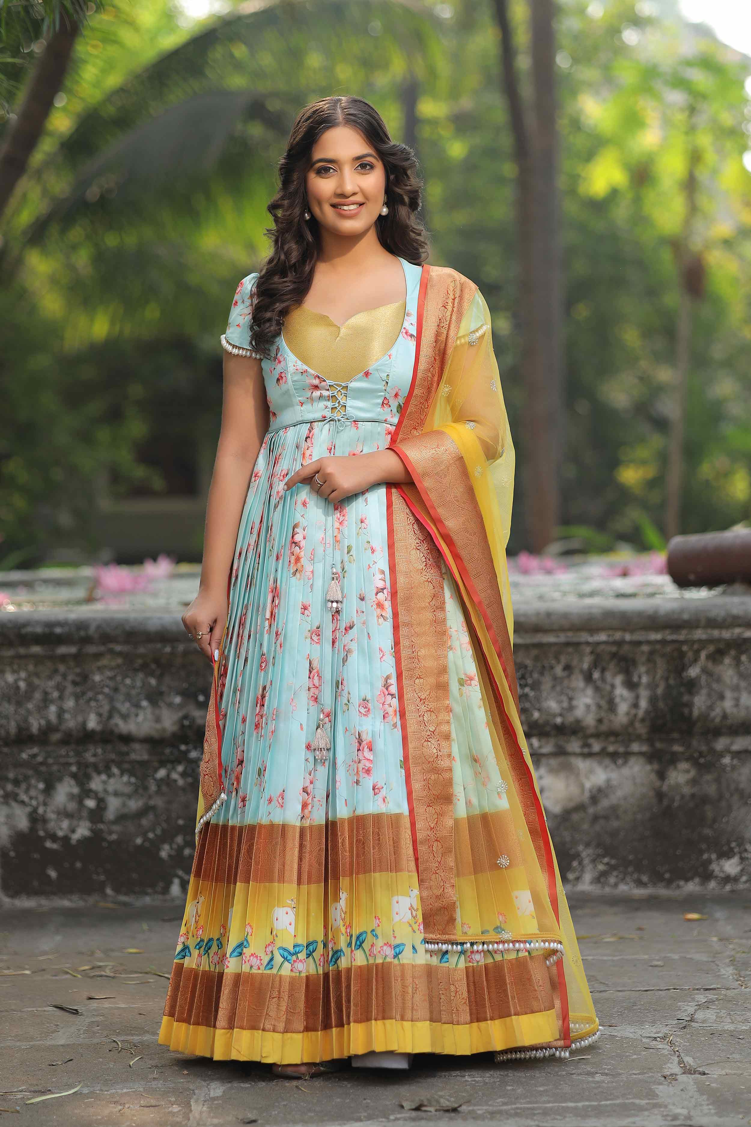 Elegant Banarasi dress in pastel blue with floral design