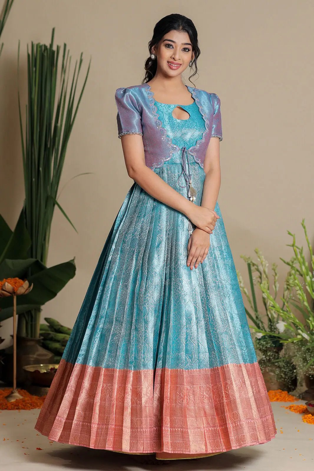 a woman in sky blue Madhu Silver Zari Jacket Dress