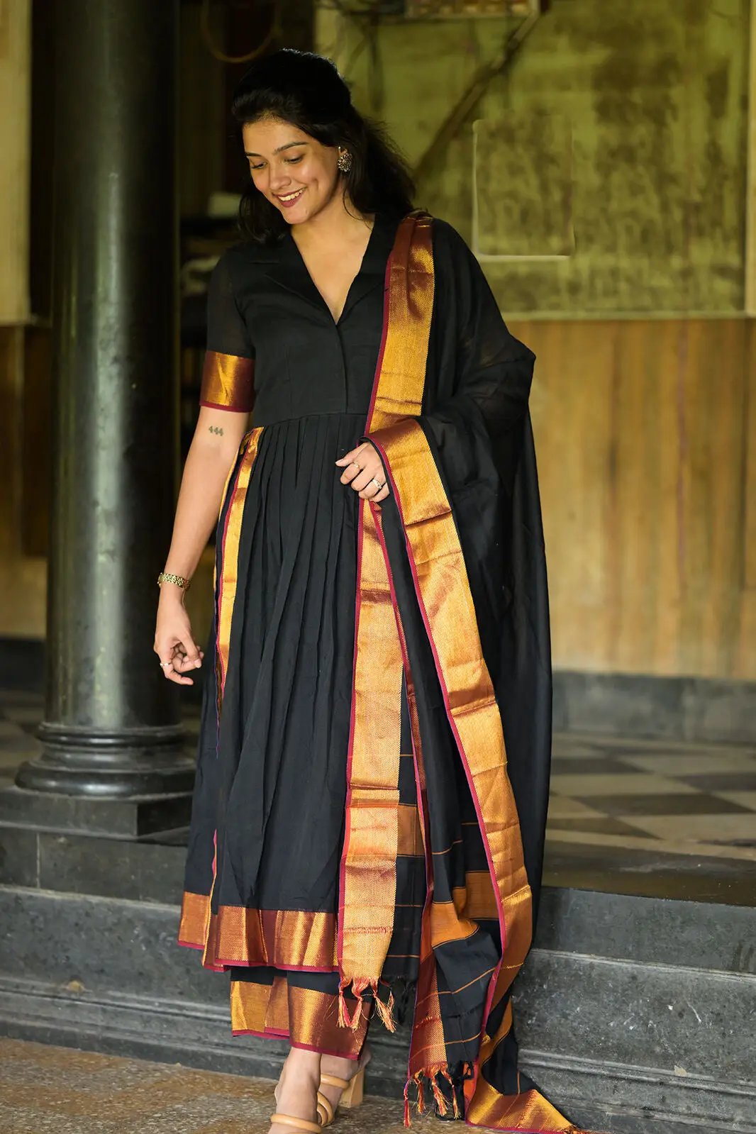 Model walking in Malini Handloom Suit Set