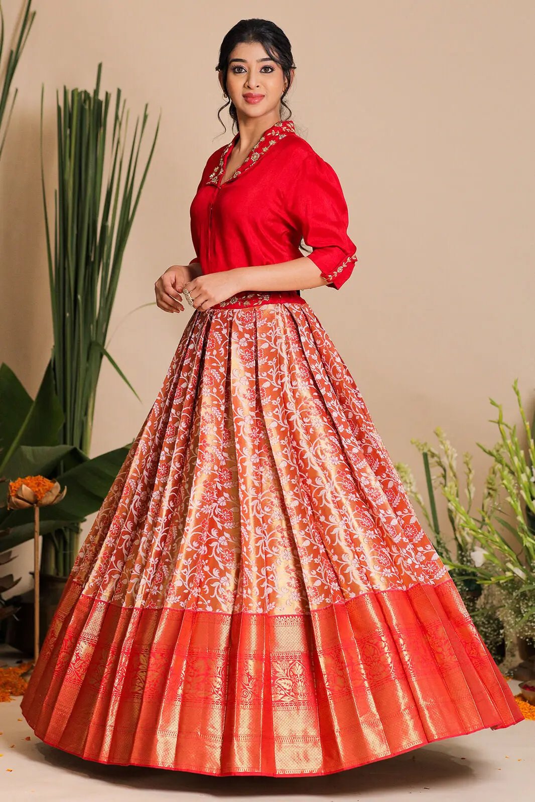 Side view of Meera Indo Western red lehenga