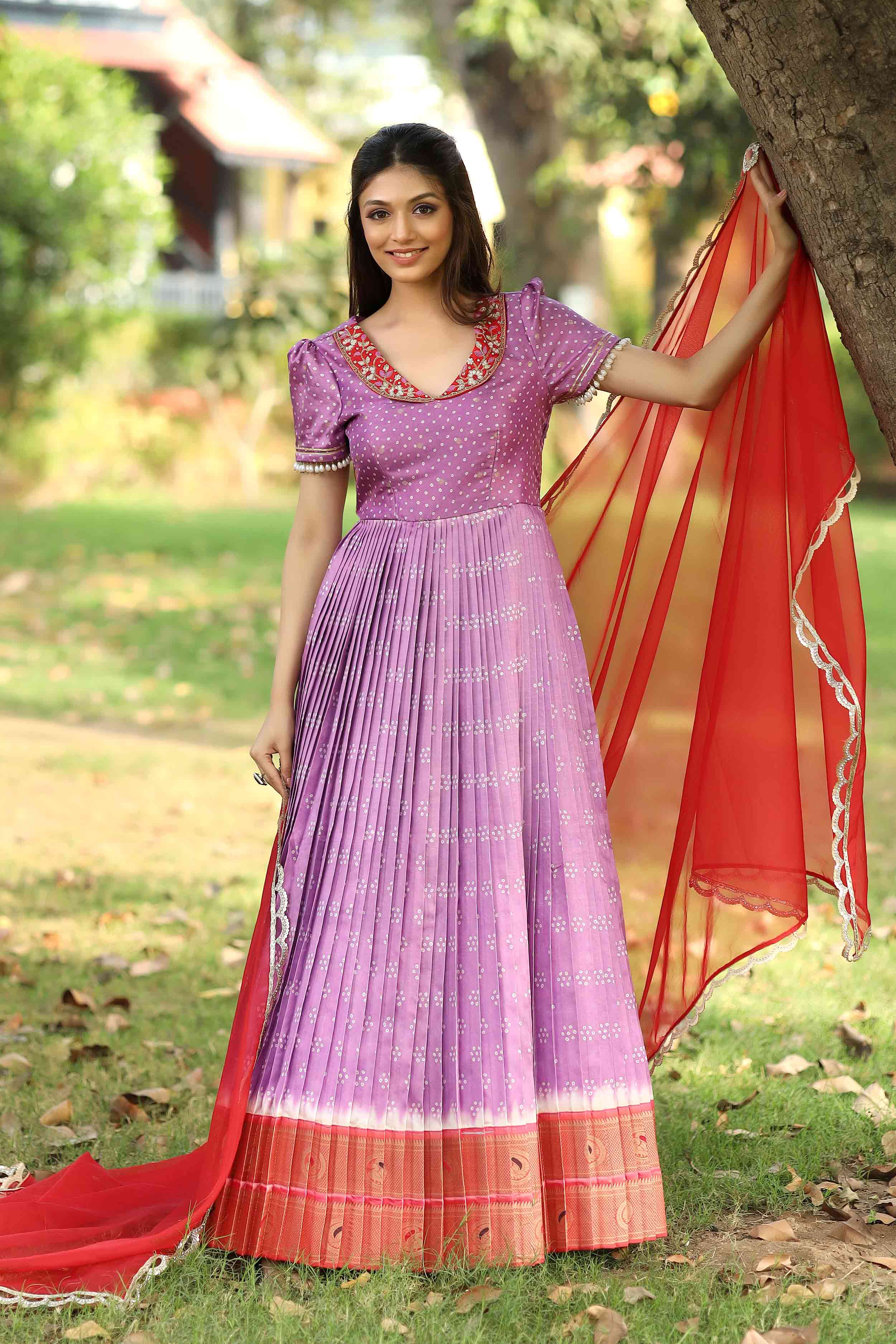 a woman in lavender Bandhani Silk Pattu Dress