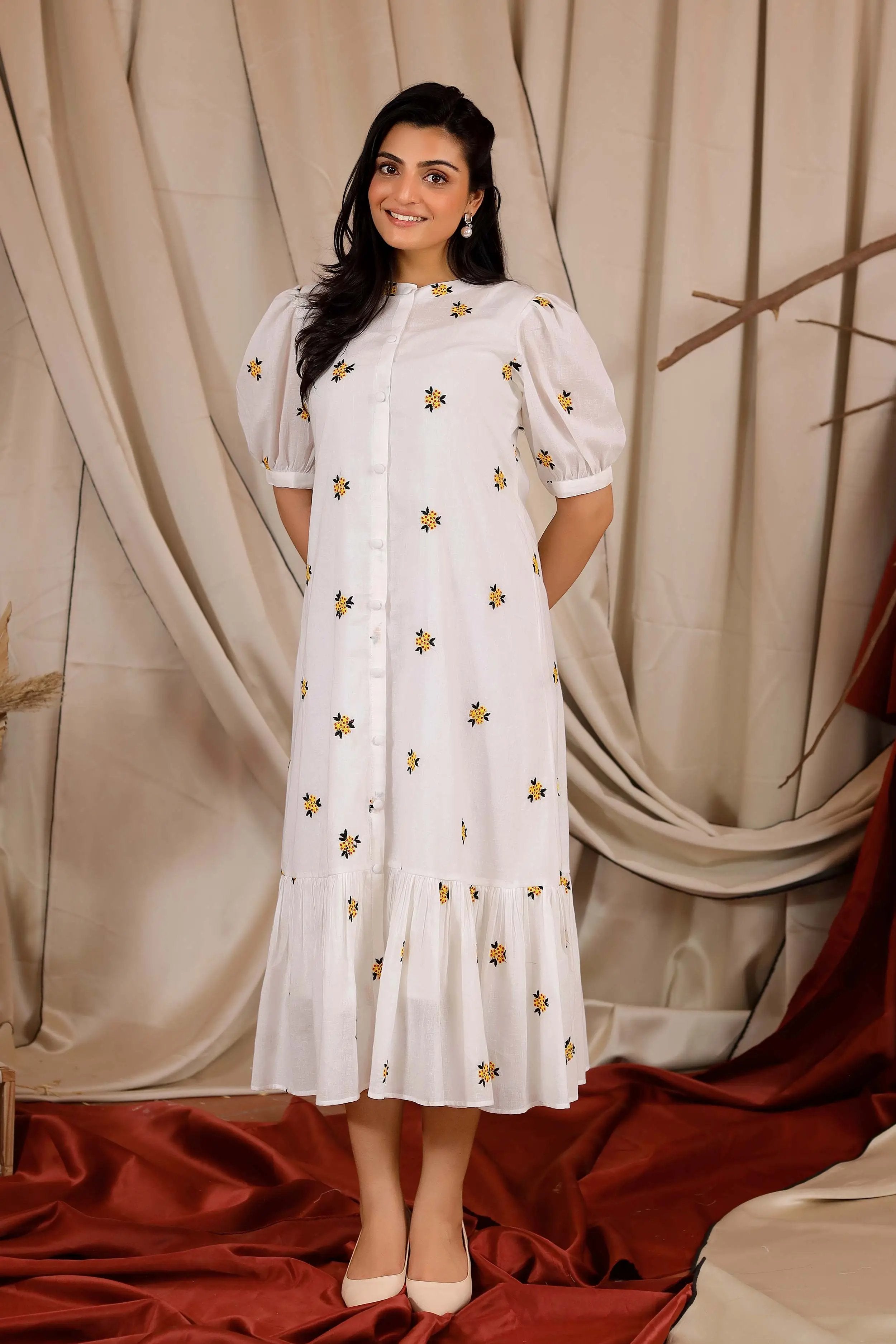 a woman in white long dress