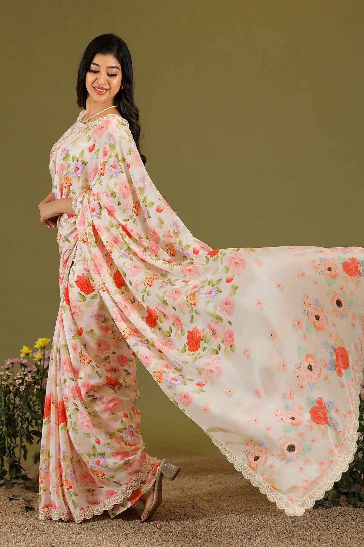 a woman in ivory Mosam Floral Retro Prints Saree - Bullionknot